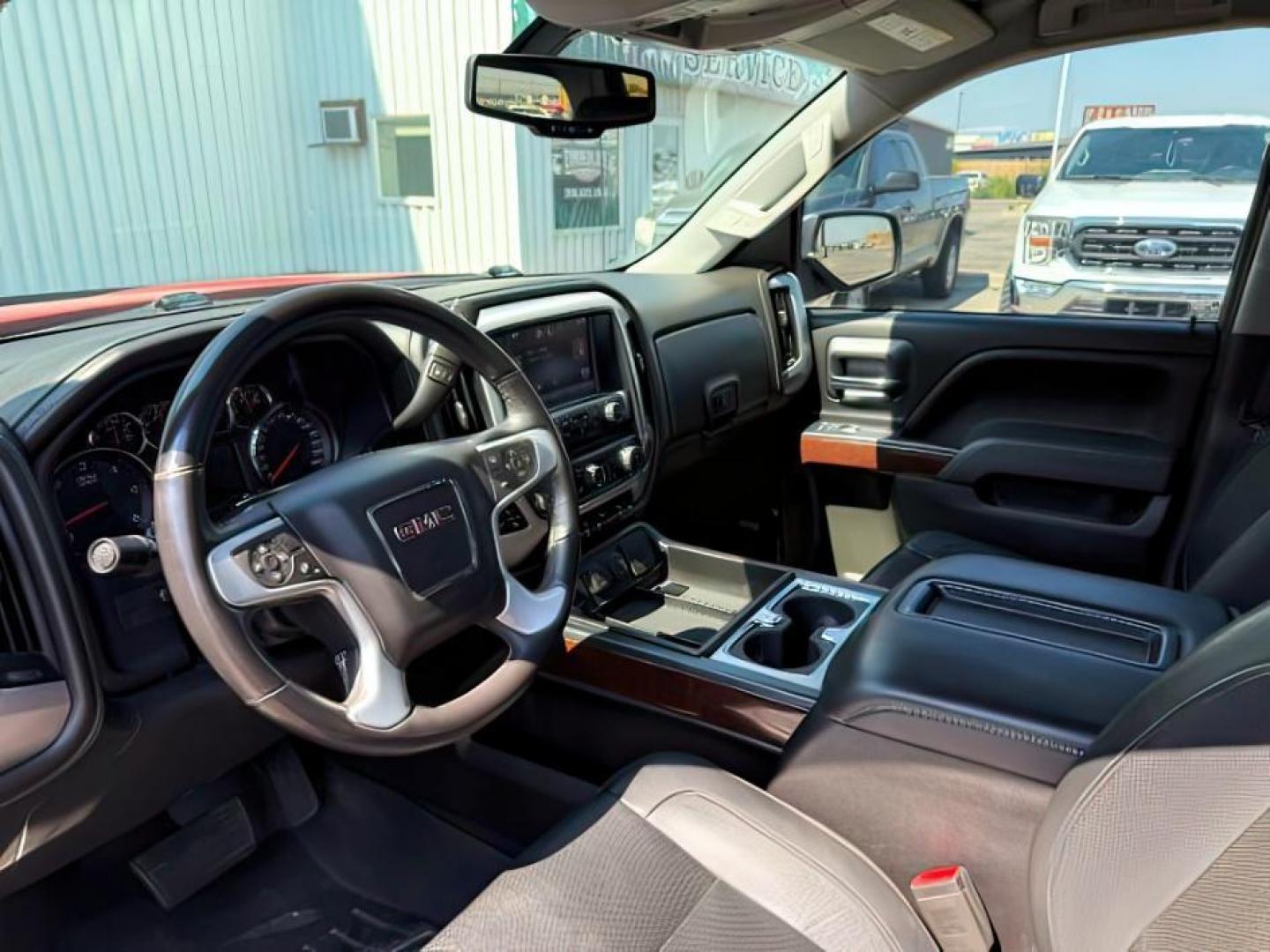 2015 RED /LEATHER GMC Sierra 1500 (3GTU2VEJ6FG) with an 62L V8 engine, Automatic transmission, located at 1175 N Woodruff Ave, Idaho Falls, ID, 83401, 43.506901, -111.999657 - At Timberline Auto, finding a great deal on your next vehicle is always easy! Our experienced sales staff's goal is to help find you the right vehicle at the right price! Our knowledgeable finance department has options for almost any credit score. We offer extended service contract options to prote - Photo#13