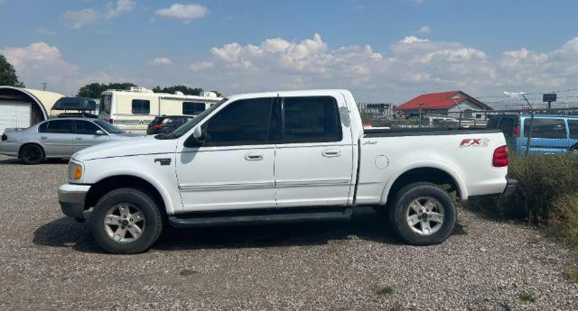 2002 Oxford White Clearcoat /Castano Dark Brown Ford F-150 (1FTRW08L42K) with an Triton 54L V-8 regular unleaded engine, Automatic transmission, located at 1175 N Woodruff Ave, Idaho Falls, ID, 83401, 43.506901, -111.999657 - At Timberline Auto, finding a great deal on your next vehicle is always easy! Our experienced sales staff's goal is to help find you the right vehicle at the right price! Our knowledgeable finance department has options for almost any credit score. We offer extended service contract options to prote - Photo#0