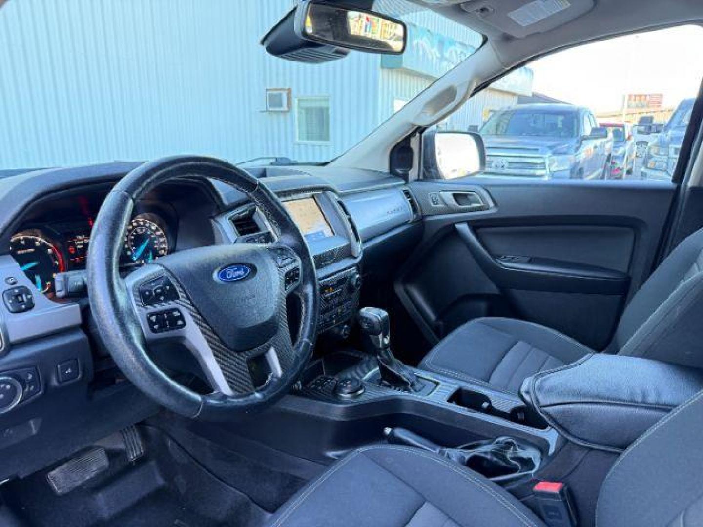 2019 Shadow Black /Ebony Ford Ranger (1FTER4FH8KL) with an EcoBoost 23L I-4 gasoline direct injection engine, Automatic transmission, located at 1175 N Woodruff Ave, Idaho Falls, ID, 83401, 43.506901, -111.999657 - At Timberline Auto, finding a great deal on your next vehicle is always easy! Our experienced sales staff's goal is to help find you the right vehicle at the right price! Our knowledgeable finance department has options for almost any credit score. We offer extended service contract options to prote - Photo#37