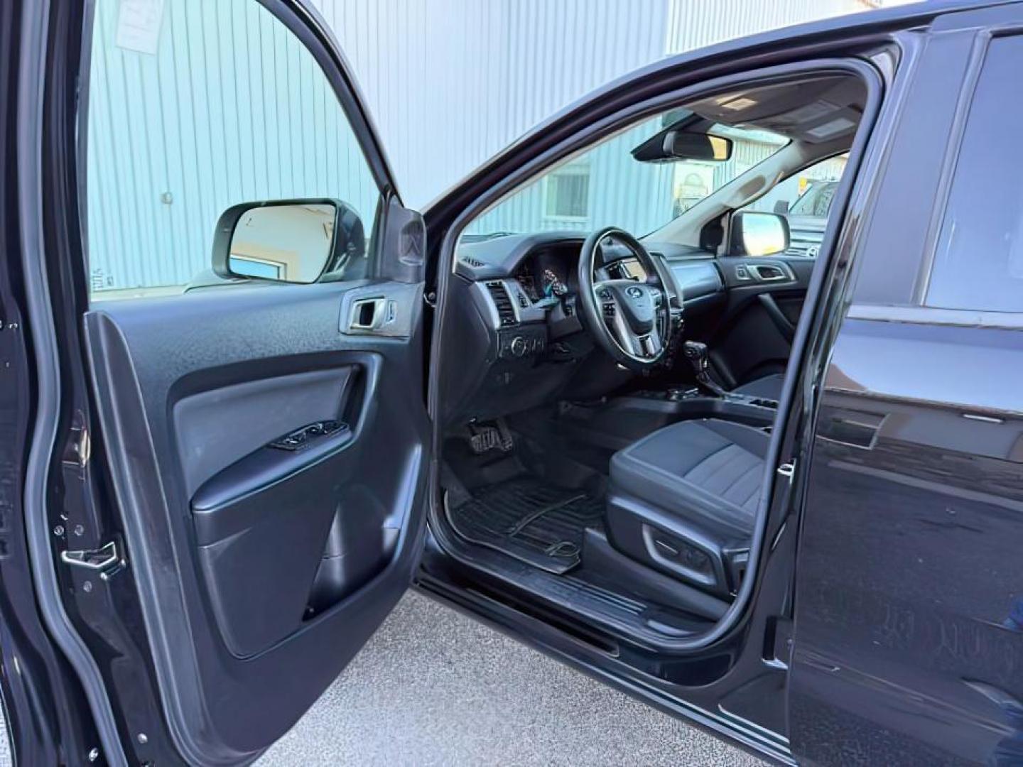 2019 Shadow Black /Ebony Ford Ranger (1FTER4FH8KL) with an EcoBoost 23L I-4 gasoline direct injection engine, Automatic transmission, located at 1175 N Woodruff Ave, Idaho Falls, ID, 83401, 43.506901, -111.999657 - At Timberline Auto, finding a great deal on your next vehicle is always easy! Our experienced sales staff's goal is to help find you the right vehicle at the right price! Our knowledgeable finance department has options for almost any credit score. We offer extended service contract options to prote - Photo#11