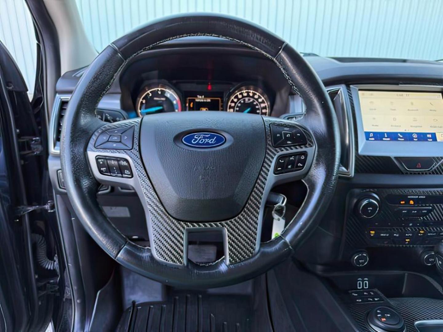2019 Shadow Black /Ebony Ford Ranger (1FTER4FH8KL) with an EcoBoost 23L I-4 gasoline direct injection engine, Automatic transmission, located at 1175 N Woodruff Ave, Idaho Falls, ID, 83401, 43.506901, -111.999657 - At Timberline Auto, finding a great deal on your next vehicle is always easy! Our experienced sales staff's goal is to help find you the right vehicle at the right price! Our knowledgeable finance department has options for almost any credit score. We offer extended service contract options to prote - Photo#14