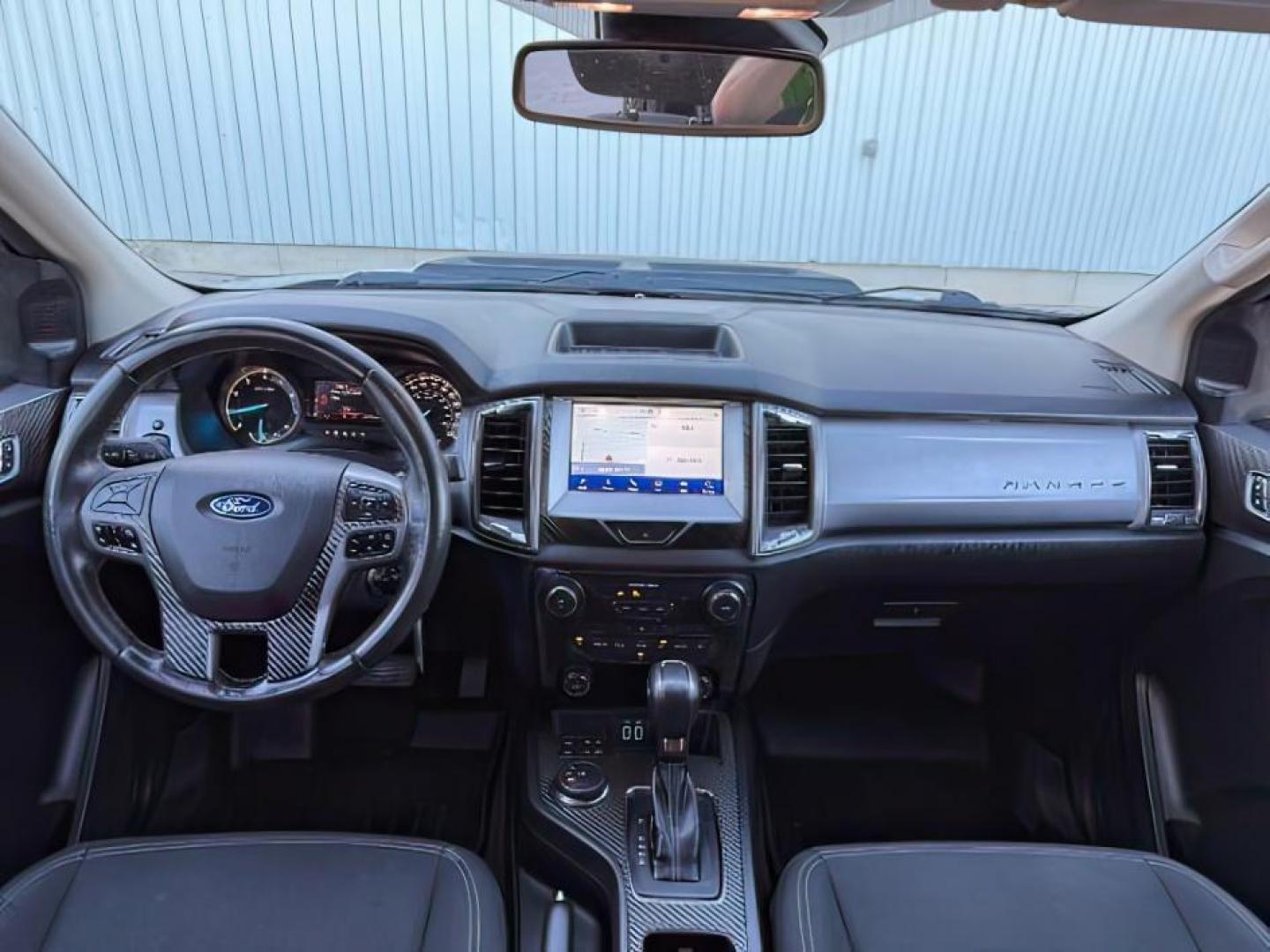 2019 Shadow Black /Ebony Ford Ranger (1FTER4FH8KL) with an EcoBoost 23L I-4 gasoline direct injection engine, Automatic transmission, located at 1175 N Woodruff Ave, Idaho Falls, ID, 83401, 43.506901, -111.999657 - At Timberline Auto, finding a great deal on your next vehicle is always easy! Our experienced sales staff's goal is to help find you the right vehicle at the right price! Our knowledgeable finance department has options for almost any credit score. We offer extended service contract options to prote - Photo#21