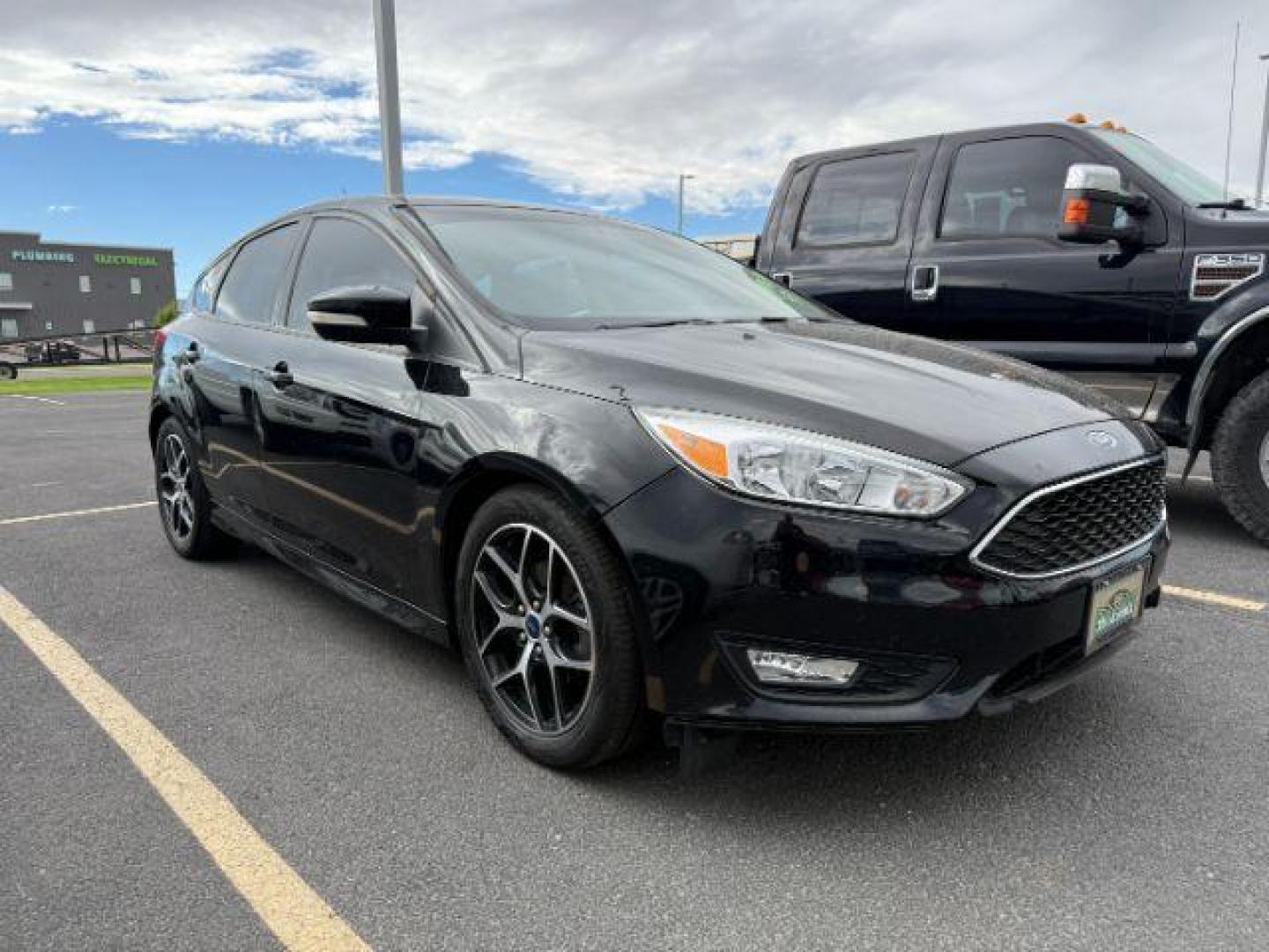 2016 Shadow Black /Charcoal Black Ford Focus (1FADP3K24GL) with an 2L I-4 gasoline direct injection engine, Automatic transmission, located at 1175 N Woodruff Ave, Idaho Falls, ID, 83401, 43.506901, -111.999657 - At Timberline Auto, finding a great deal on your next vehicle is always easy! Our experienced sales staff's goal is to help find you the right vehicle at the right price! Our knowledgeable finance department has options for almost any credit score. We offer extended service contract options to prote - Photo#0