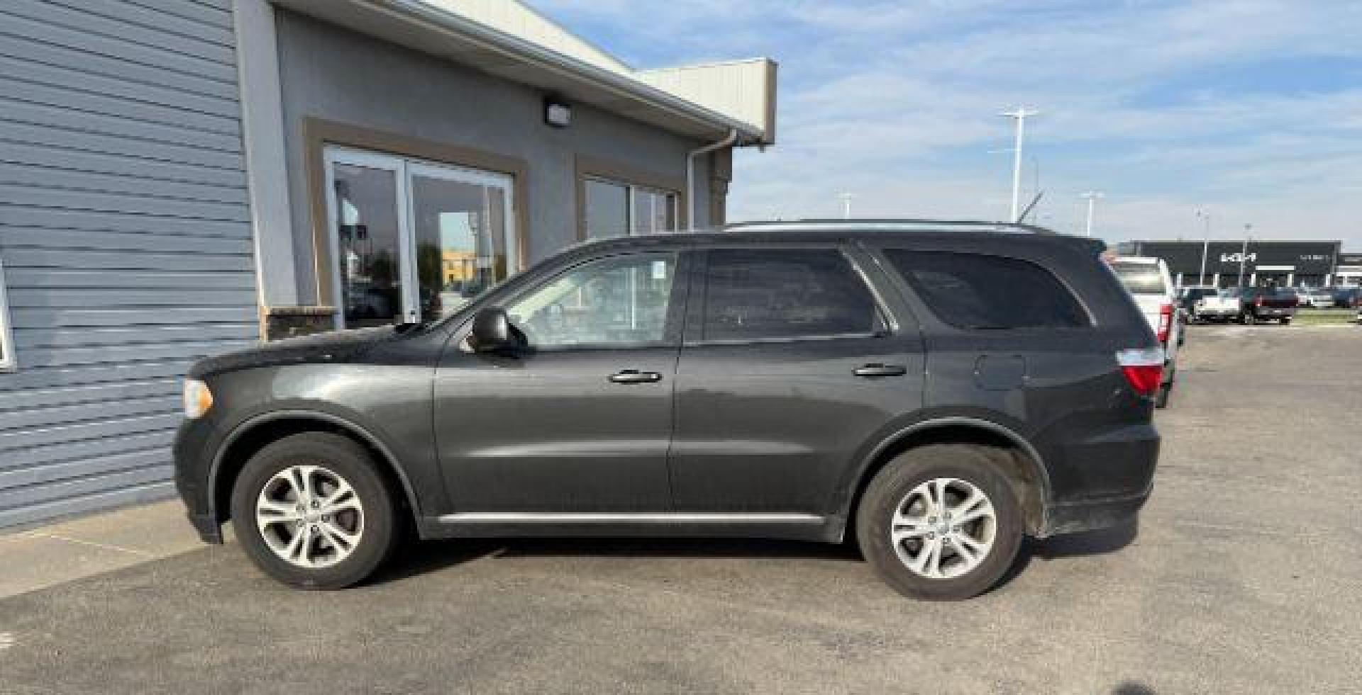 2011 BLACK /Black Dodge Durango (1D4RE2GG1BC) with an 36L V-6 DOHC engine, Automatic transmission, located at 1175 N Woodruff Ave, Idaho Falls, ID, 83401, 43.506901, -111.999657 - At Timberline Auto, finding a great deal on your next vehicle is always easy! Our experienced sales staff's goal is to help find you the right vehicle at the right price! Our knowledgeable finance department has options for almost any credit score. We offer extended service contract options to prote - Photo#1