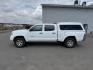 2014 Super White /Graphite Toyota Tacoma (3TMMU4FN9EM) with an 4L V-6 DOHC engine, Automatic transmission, located at 1175 N Woodruff Ave, Idaho Falls, ID, 83401, 43.506901, -111.999657 - Photo#21