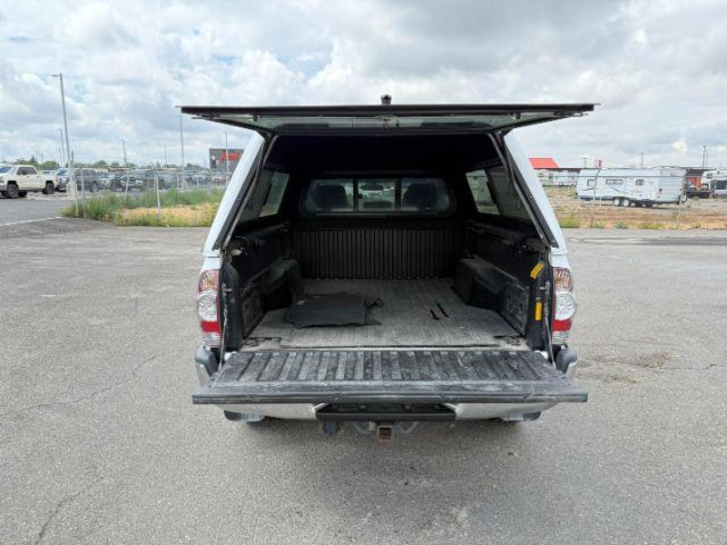 2014 Super White /Graphite Toyota Tacoma (3TMMU4FN9EM) with an 4L V-6 DOHC engine, Automatic transmission, located at 1175 N Woodruff Ave, Idaho Falls, ID, 83401, 43.506901, -111.999657 - Photo#24