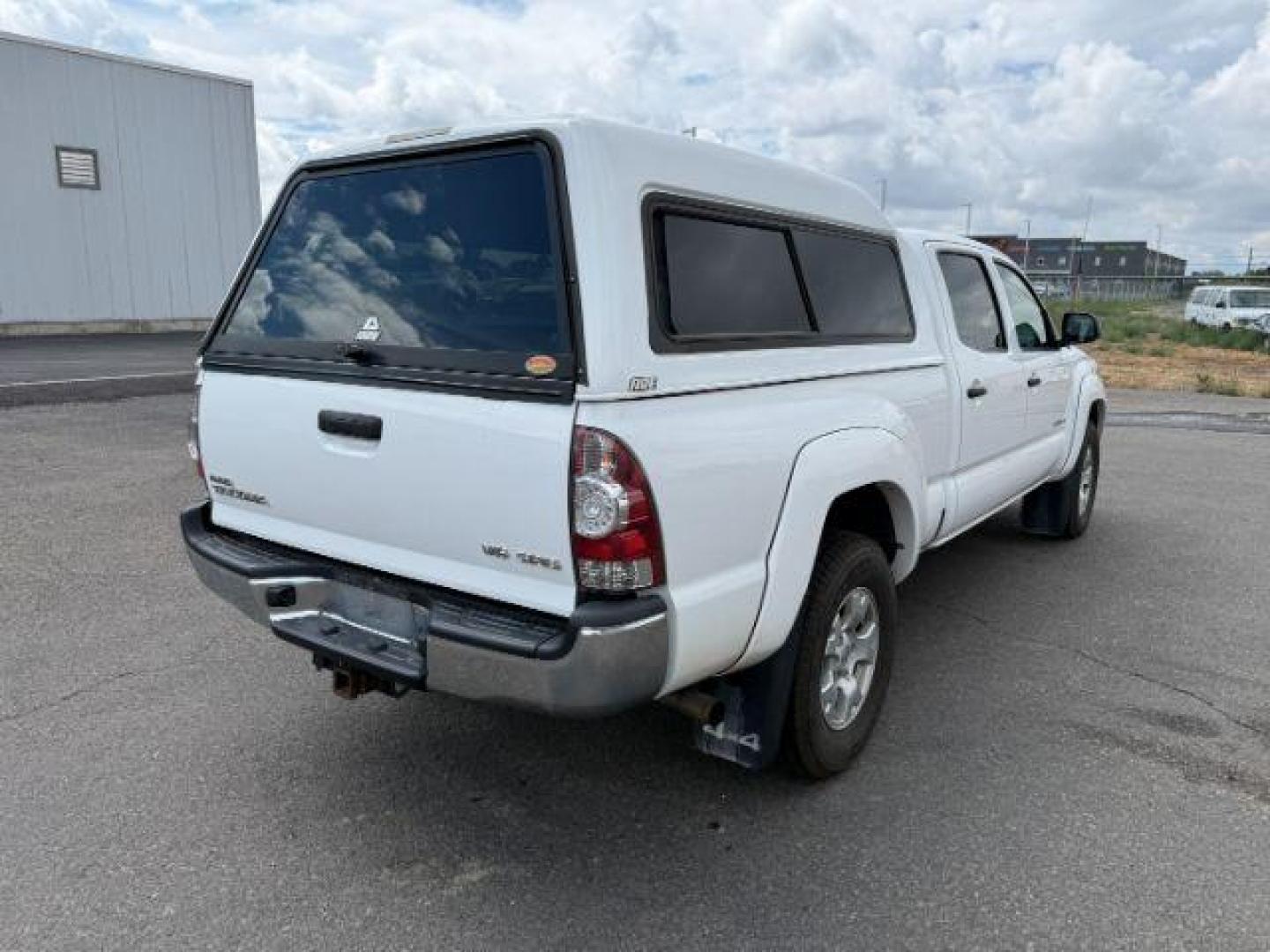 2014 Super White /Graphite Toyota Tacoma (3TMMU4FN9EM) with an 4L V-6 DOHC engine, Automatic transmission, located at 1175 N Woodruff Ave, Idaho Falls, ID, 83401, 43.506901, -111.999657 - Photo#25