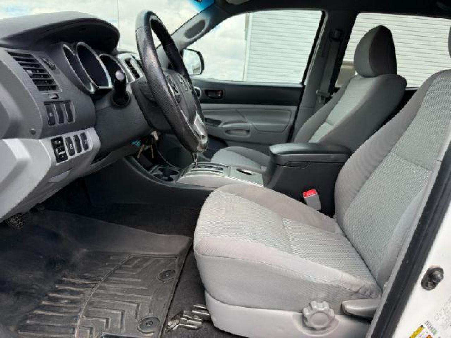 2014 Super White /Graphite Toyota Tacoma (3TMMU4FN9EM) with an 4L V-6 DOHC engine, Automatic transmission, located at 1175 N Woodruff Ave, Idaho Falls, ID, 83401, 43.506901, -111.999657 - Photo#31