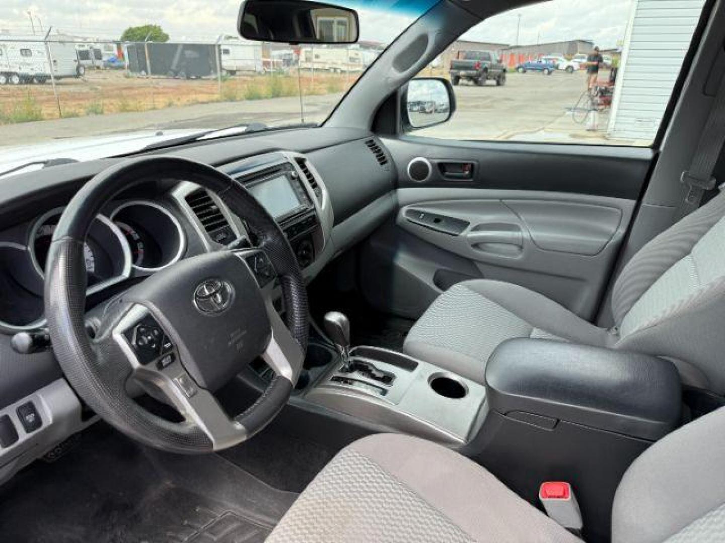 2014 Super White /Graphite Toyota Tacoma (3TMMU4FN9EM) with an 4L V-6 DOHC engine, Automatic transmission, located at 1175 N Woodruff Ave, Idaho Falls, ID, 83401, 43.506901, -111.999657 - Photo#32
