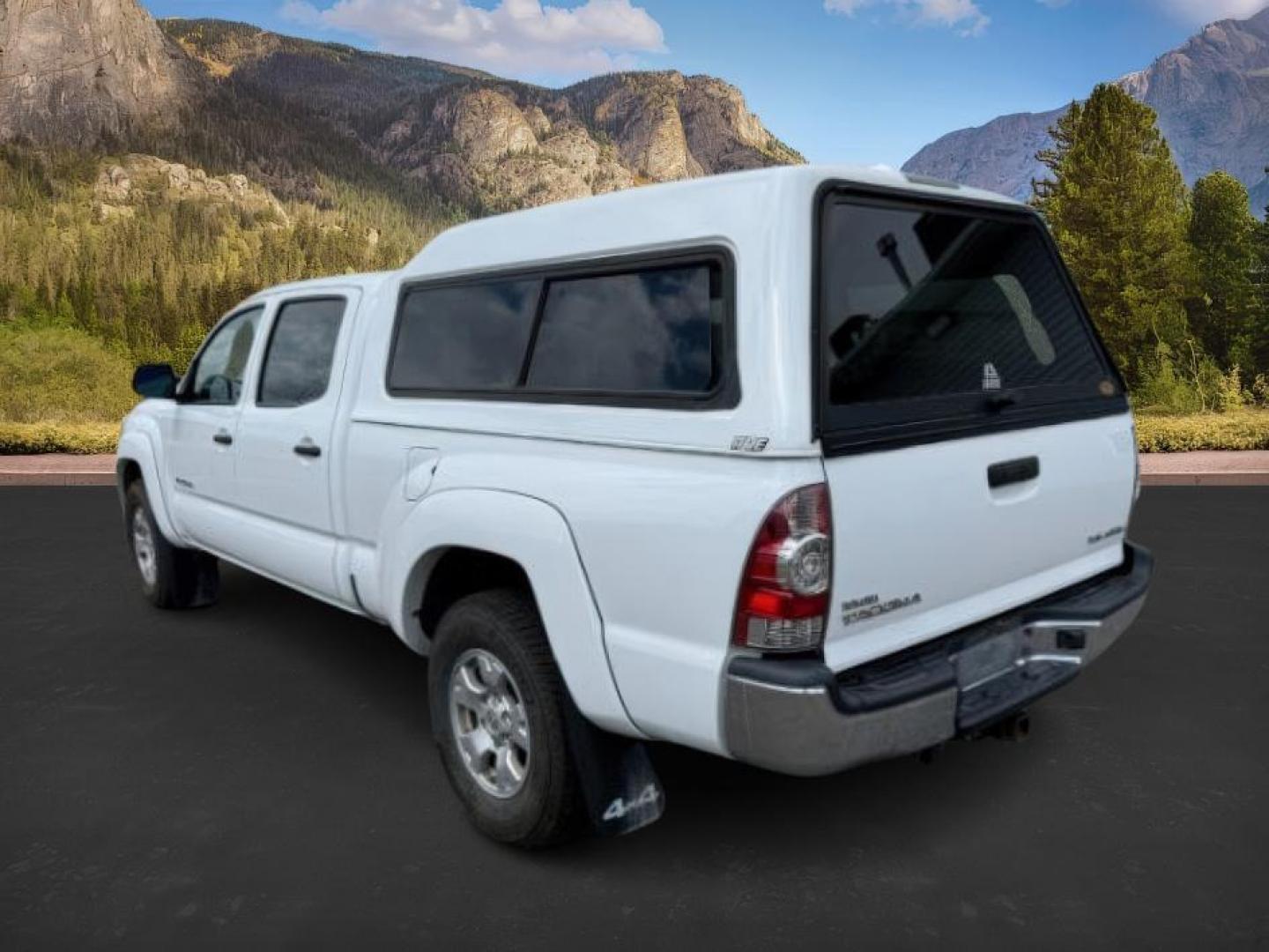 2014 Super White /Graphite Toyota Tacoma (3TMMU4FN9EM) with an 4L V-6 DOHC engine, Automatic transmission, located at 1175 N Woodruff Ave, Idaho Falls, ID, 83401, 43.506901, -111.999657 - Photo#2