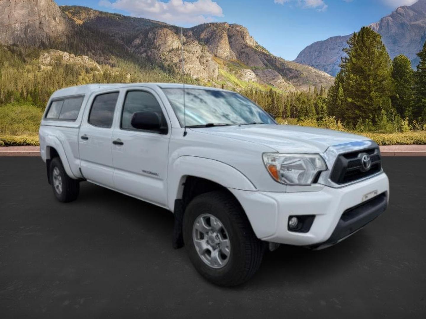 2014 Super White /Graphite Toyota Tacoma (3TMMU4FN9EM) with an 4L V-6 DOHC engine, Automatic transmission, located at 1175 N Woodruff Ave, Idaho Falls, ID, 83401, 43.506901, -111.999657 - Photo#7