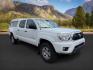 2014 Super White /Graphite Toyota Tacoma (3TMMU4FN9EM) with an 4L V-6 DOHC engine, Automatic transmission, located at 1175 N Woodruff Ave, Idaho Falls, ID, 83401, 43.506901, -111.999657 - Photo#7