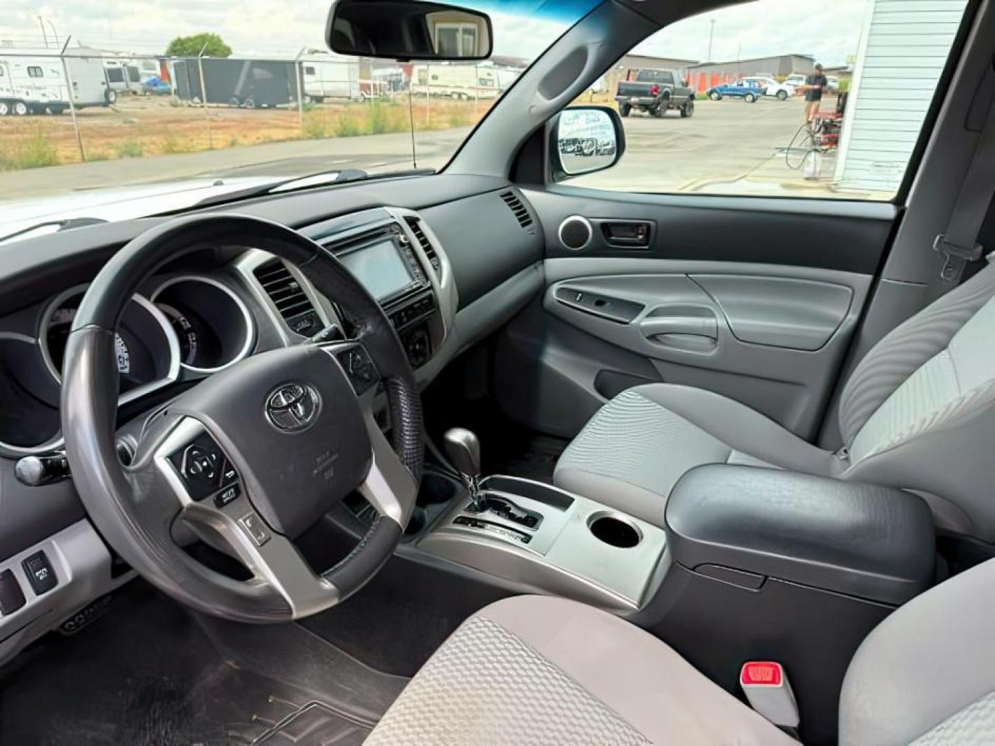 2014 Super White /Graphite Toyota Tacoma (3TMMU4FN9EM) with an 4L V-6 DOHC engine, Automatic transmission, located at 1175 N Woodruff Ave, Idaho Falls, ID, 83401, 43.506901, -111.999657 - Photo#12