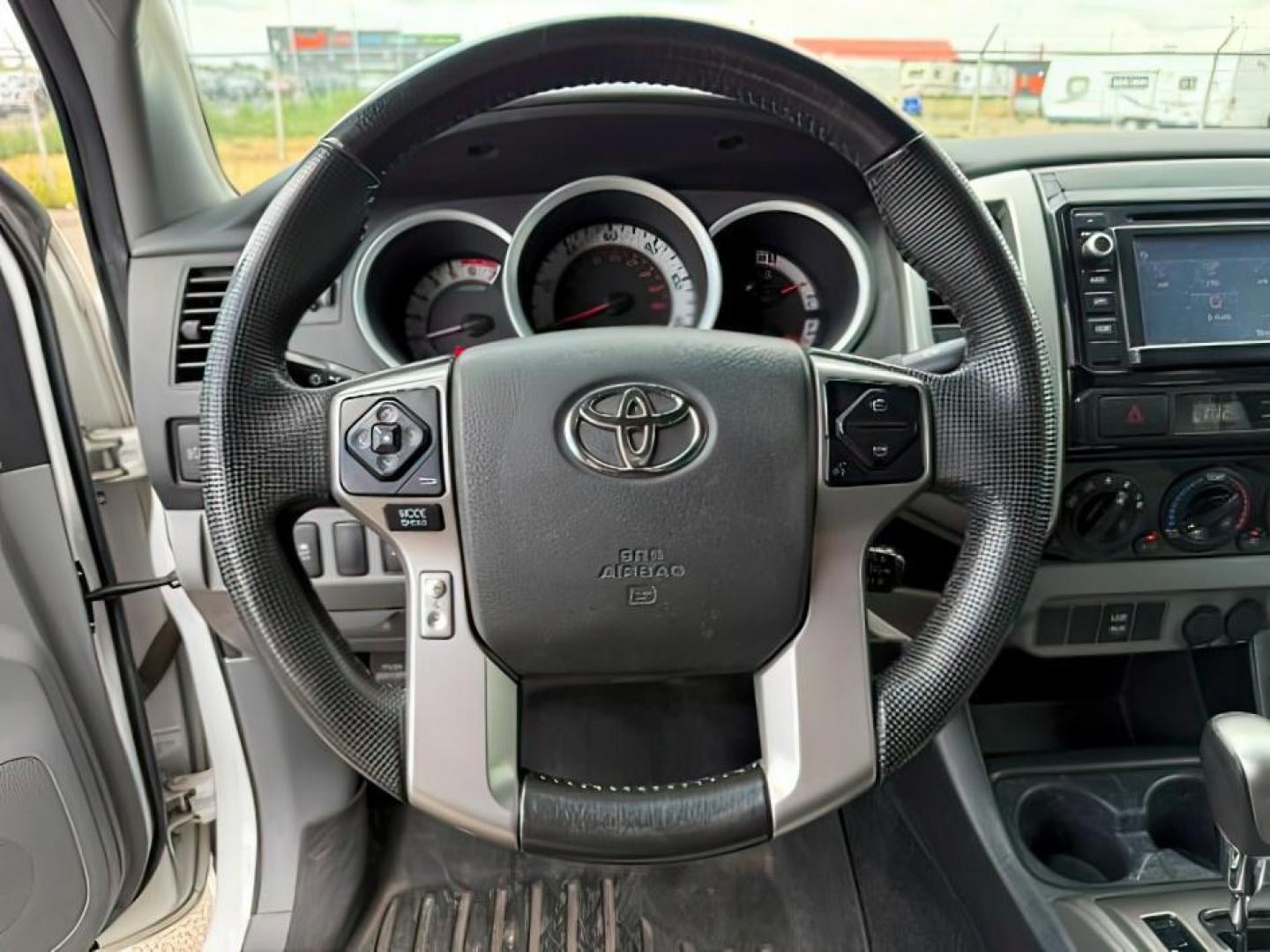 2014 Super White /Graphite Toyota Tacoma (3TMMU4FN9EM) with an 4L V-6 DOHC engine, Automatic transmission, located at 1175 N Woodruff Ave, Idaho Falls, ID, 83401, 43.506901, -111.999657 - Photo#13