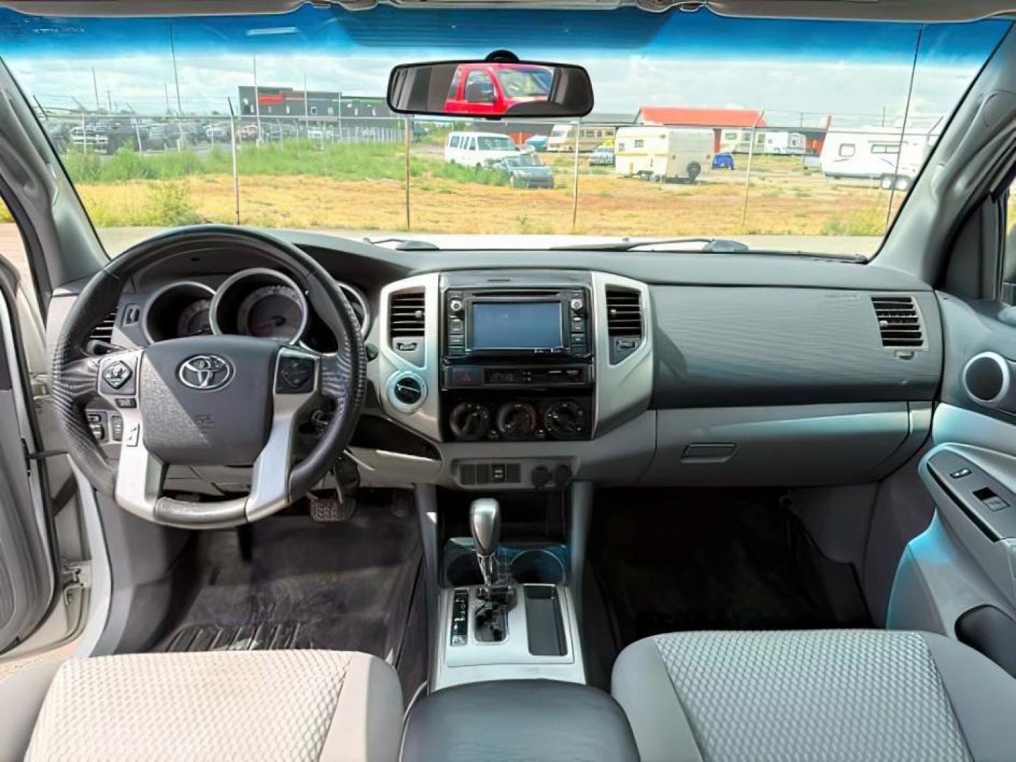 2014 Super White /Graphite Toyota Tacoma (3TMMU4FN9EM) with an 4L V-6 DOHC engine, Automatic transmission, located at 1175 N Woodruff Ave, Idaho Falls, ID, 83401, 43.506901, -111.999657 - Photo#18
