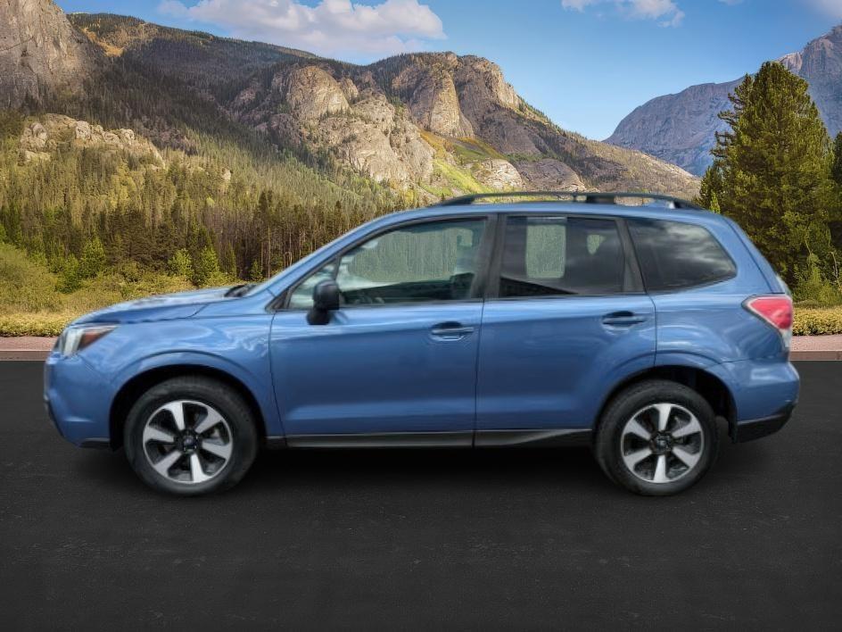 2018 Quartz Blue Pearl /Black Subaru Forester (JF2SJABC4JH) with an 25L H-4 DOHC engine, Automatic transmission, located at 1175 N Woodruff Ave, Idaho Falls, ID, 83401, 43.506901, -111.999657 - 2018 Subaru Forester AWD is built for year-round Idaho driving, with Symmetrical All-Wheel Drive providing confident traction in snow, rain, and gravel. Powered by a 2.5L BOXER engine paired with a CVT automatic transmission, it delivers a smooth and efficient daily driving experience. Inside, it of - Photo#1