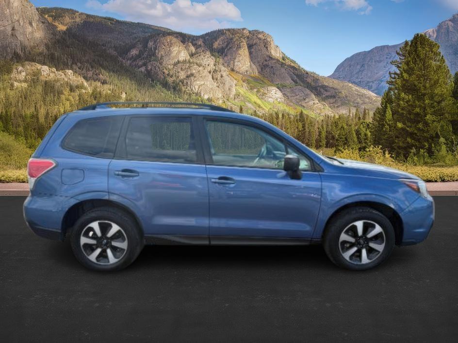 2018 Quartz Blue Pearl /Black Subaru Forester (JF2SJABC4JH) with an 25L H-4 DOHC engine, Automatic transmission, located at 1175 N Woodruff Ave, Idaho Falls, ID, 83401, 43.506901, -111.999657 - 2018 Subaru Forester AWD is built for year-round Idaho driving, with Symmetrical All-Wheel Drive providing confident traction in snow, rain, and gravel. Powered by a 2.5L BOXER engine paired with a CVT automatic transmission, it delivers a smooth and efficient daily driving experience. Inside, it of - Photo#7