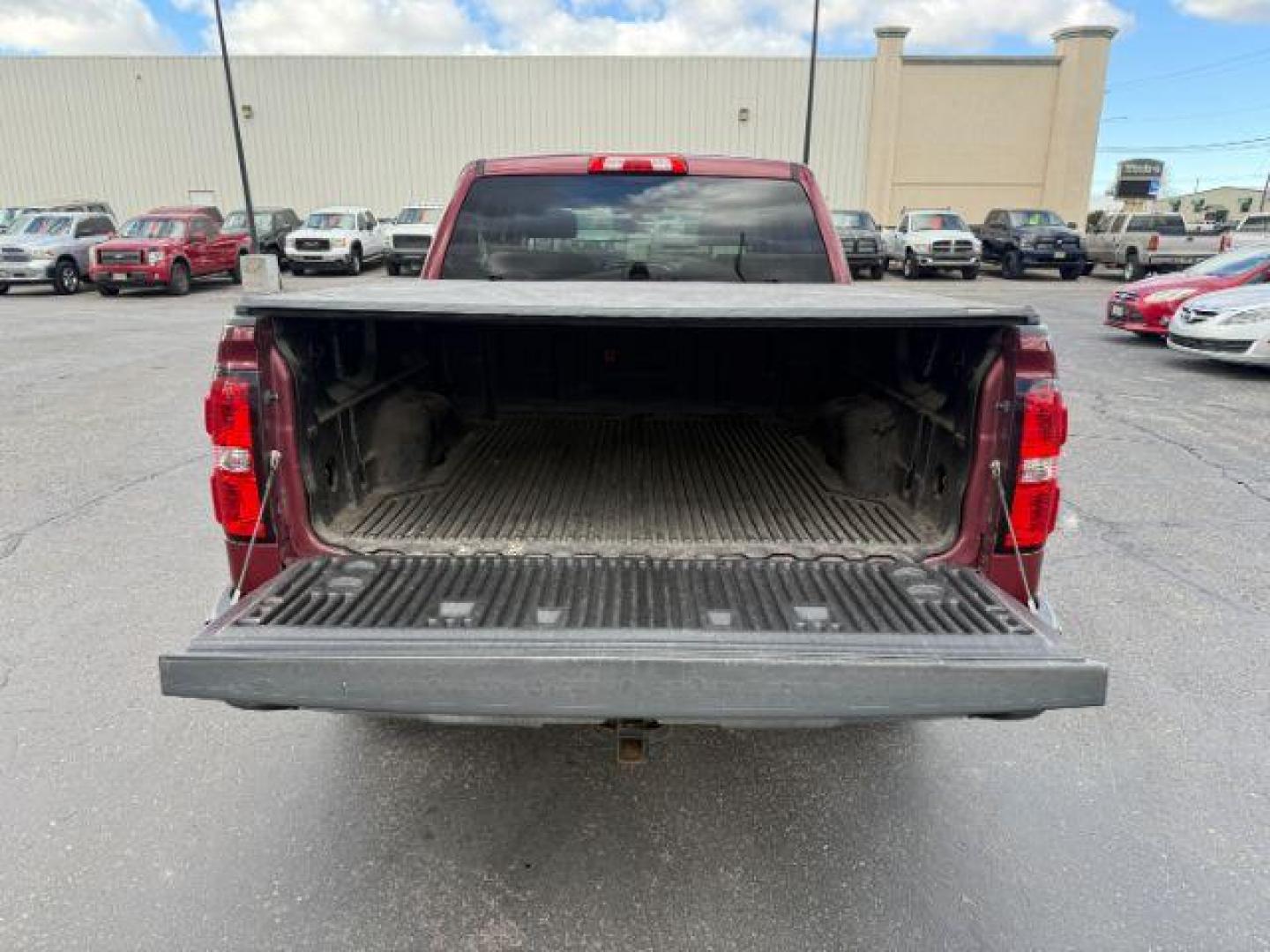 2014 MAROON /Jet Black GMC Sierra 1500 (3GTU2UEC5EG) with an EcoTec3 53L V-8 gasoline direct injection engine, Automatic transmission, located at 1175 N Woodruff Ave, Idaho Falls, ID, 83401, 43.506901, -111.999657 - At Timberline Auto, finding a great deal on your next vehicle is always easy! Our experienced sales staff's goal is to help find you the right vehicle at the right price! Our knowledgeable finance department has options for almost any credit score. We offer extended service contract options to prote - Photo#27