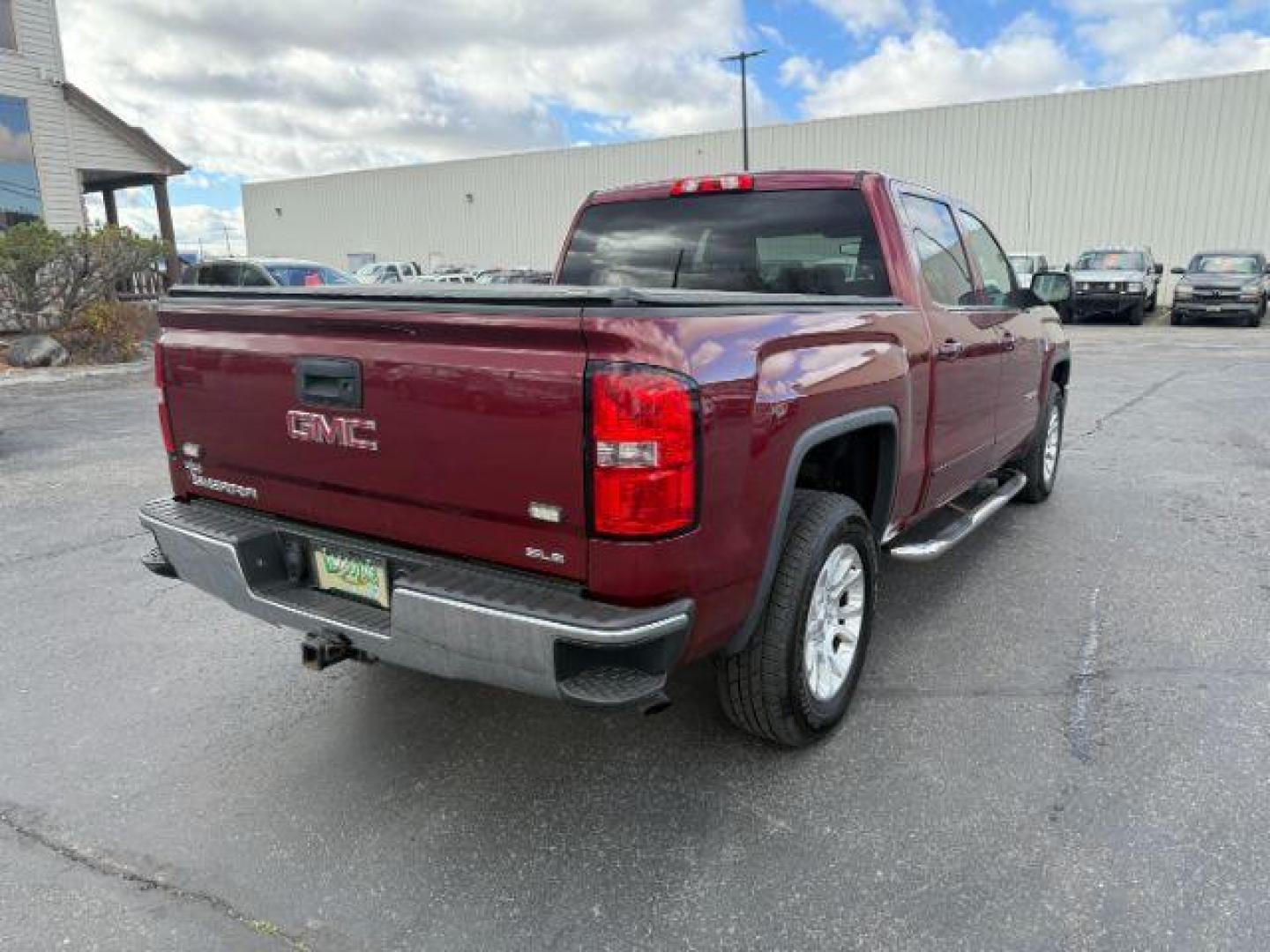 2014 MAROON /Jet Black GMC Sierra 1500 (3GTU2UEC5EG) with an EcoTec3 53L V-8 gasoline direct injection engine, Automatic transmission, located at 1175 N Woodruff Ave, Idaho Falls, ID, 83401, 43.506901, -111.999657 - At Timberline Auto, finding a great deal on your next vehicle is always easy! Our experienced sales staff's goal is to help find you the right vehicle at the right price! Our knowledgeable finance department has options for almost any credit score. We offer extended service contract options to prote - Photo#28