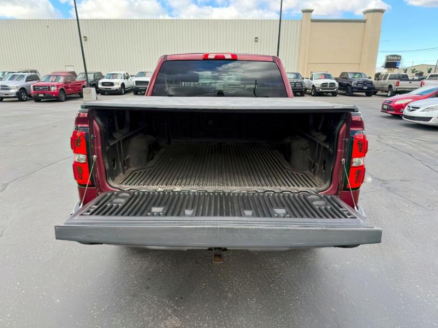 2014 MAROON /Jet Black GMC Sierra 1500 (3GTU2UEC5EG) with an EcoTec3 53L V-8 gasoline direct injection engine, Automatic transmission, located at 1175 N Woodruff Ave, Idaho Falls, ID, 83401, 43.506901, -111.999657 - At Timberline Auto, finding a great deal on your next vehicle is always easy! Our experienced sales staff's goal is to help find you the right vehicle at the right price! Our knowledgeable finance department has options for almost any credit score. We offer extended service contract options to prote - Photo#5