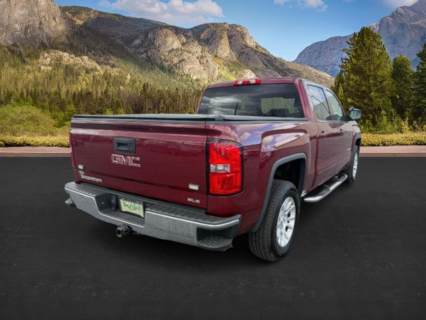 2014 MAROON /Jet Black GMC Sierra 1500 (3GTU2UEC5EG) with an EcoTec3 53L V-8 gasoline direct injection engine, Automatic transmission, located at 1175 N Woodruff Ave, Idaho Falls, ID, 83401, 43.506901, -111.999657 - At Timberline Auto, finding a great deal on your next vehicle is always easy! Our experienced sales staff's goal is to help find you the right vehicle at the right price! Our knowledgeable finance department has options for almost any credit score. We offer extended service contract options to prote - Photo#6
