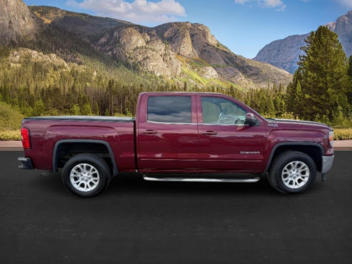 2014 MAROON /Jet Black GMC Sierra 1500 (3GTU2UEC5EG) with an EcoTec3 53L V-8 gasoline direct injection engine, Automatic transmission, located at 1175 N Woodruff Ave, Idaho Falls, ID, 83401, 43.506901, -111.999657 - At Timberline Auto, finding a great deal on your next vehicle is always easy! Our experienced sales staff's goal is to help find you the right vehicle at the right price! Our knowledgeable finance department has options for almost any credit score. We offer extended service contract options to prote - Photo#7