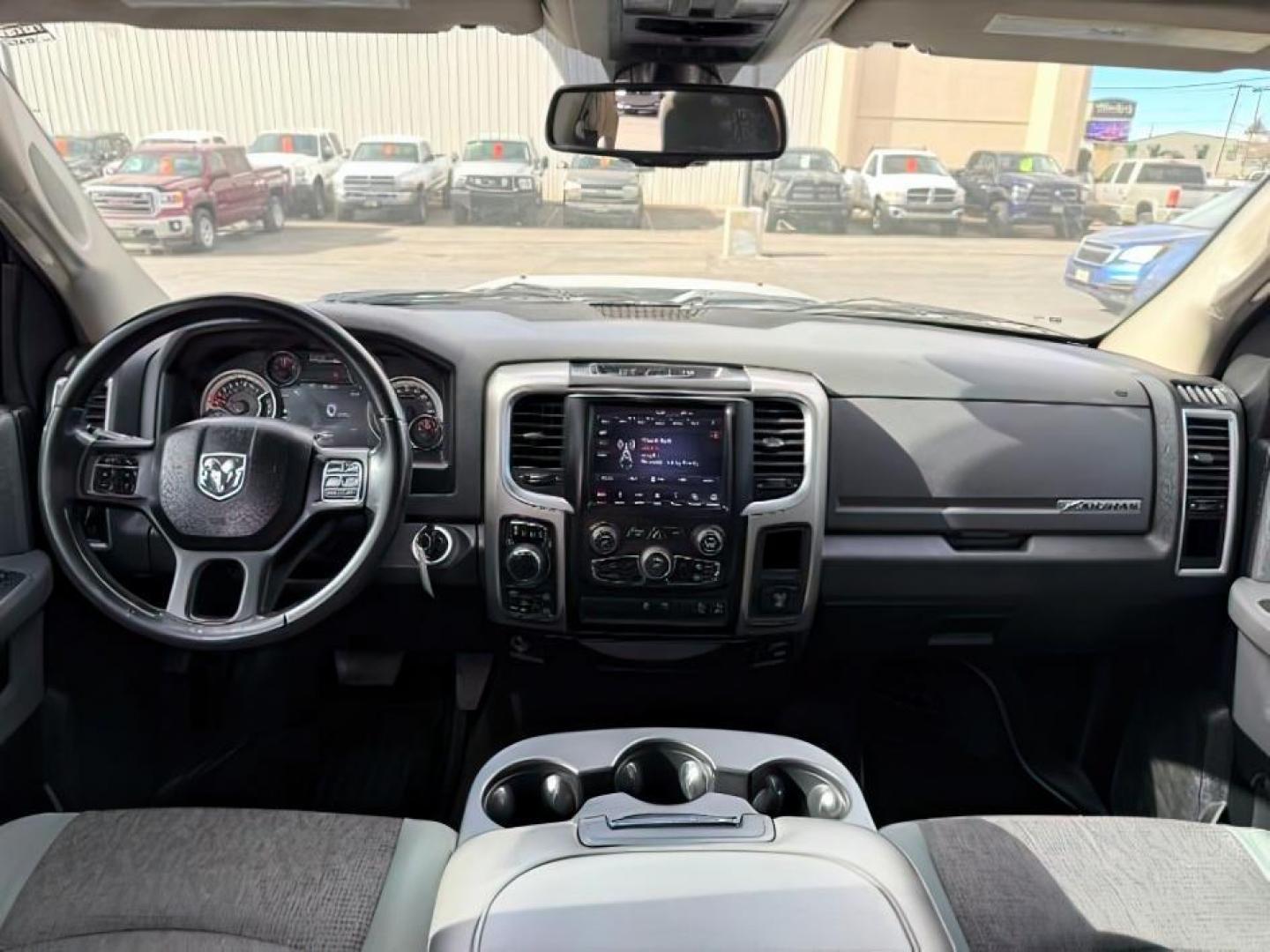 2018 SILVER /CLOTH Ram 1500 BIG HORN (1C6RR7TT6JS) with an 5.7 V8 engine, AUTOMATIC transmission, located at 1235 N Woodruff Ave., Idaho Falls, 83401, (208) 523-1053, 43.507172, -112.000488 - At Timberline Auto, finding a great deal on your next vehicle is always easy! Our experienced sales staff's goal is to help find you the right vehicle at the right price! Our knowledgeable finance department has options for almost any credit score. We offer extended service contract options to prote - Photo#20
