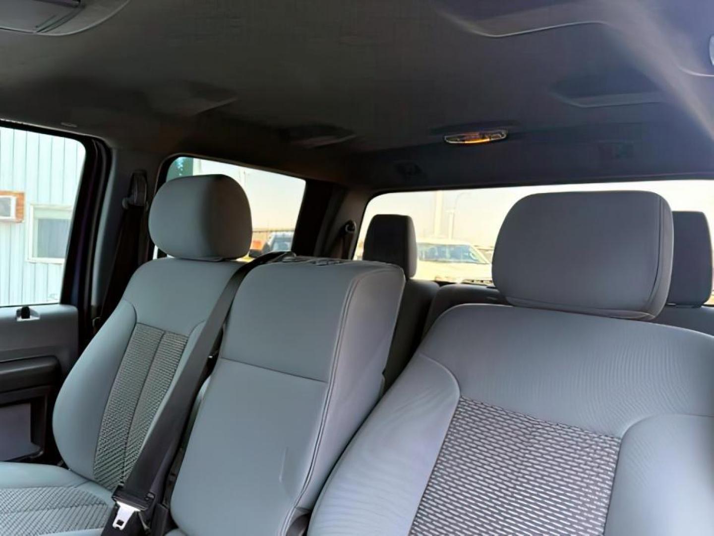 2013 BLUE /CLOTH Ford F-350 (1FT8W3DT0DE) with an Powerstroke 67L V-8 diesel direct injection engine, Automatic transmission, located at 1175 N Woodruff Ave, Idaho Falls, ID, 83401, 43.506901, -111.999657 - At Timberline Auto, finding a great deal on your next vehicle is always easy! Our experienced sales staff's goal is to help find you the right vehicle at the right price! Our knowledgeable finance department has options for almost any credit score. We offer extended service contract options to prote - Photo#14