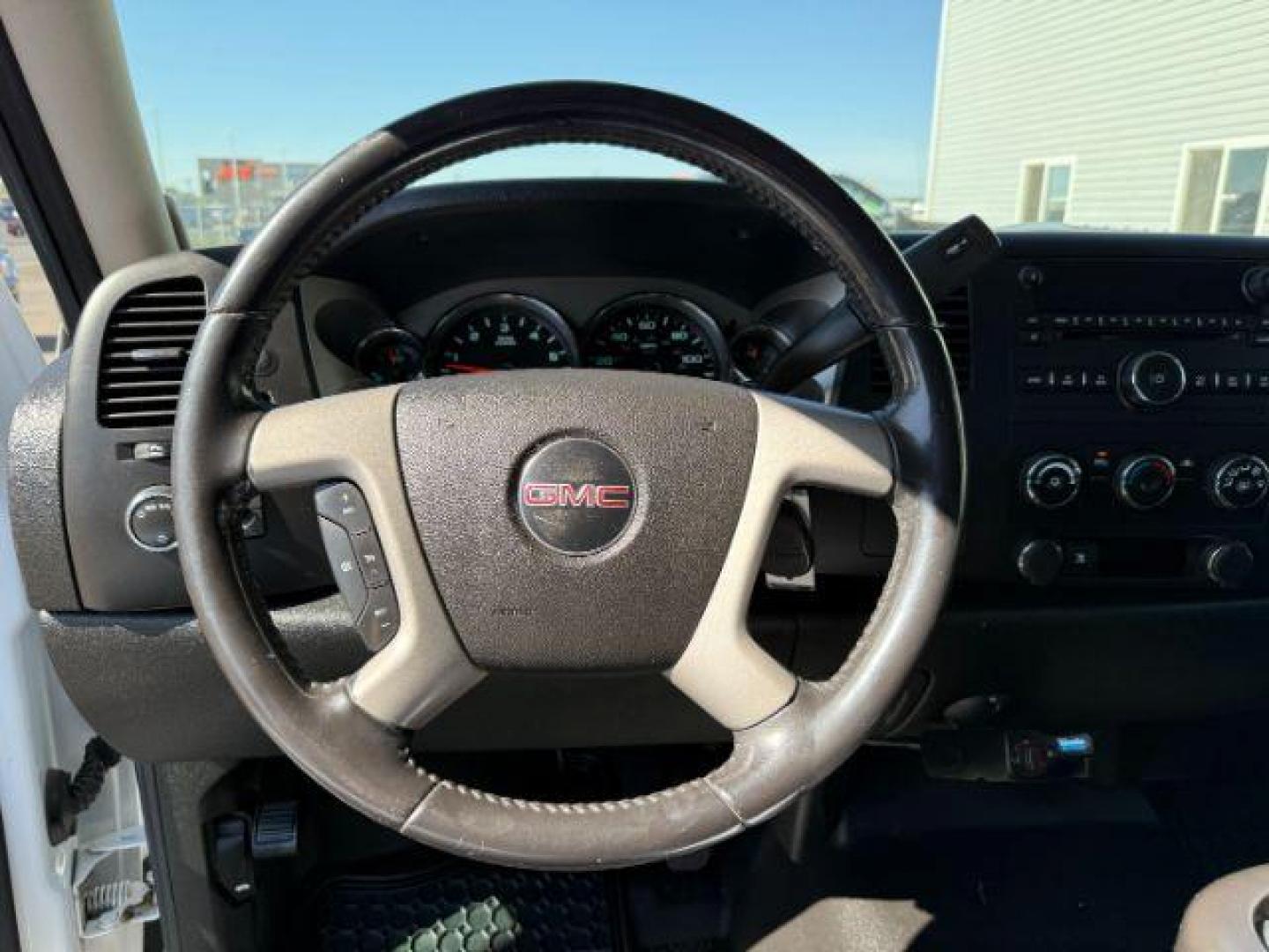 2009 Summit White /Dark Titanium GMC Sierra 2500HD (1GTHK49K19E) with an Vortec 6L V-8 variable valve control engine, Automatic transmission, located at 1175 N Woodruff Ave, Idaho Falls, ID, 83401, 43.506901, -111.999657 - At Timberline Auto, finding a great deal on your next vehicle is always easy! Our experienced sales staff's goal is to help find you the right vehicle at the right price! Our knowledgeable finance department has options for almost any credit score. We offer extended service contract options to prote - Photo#31