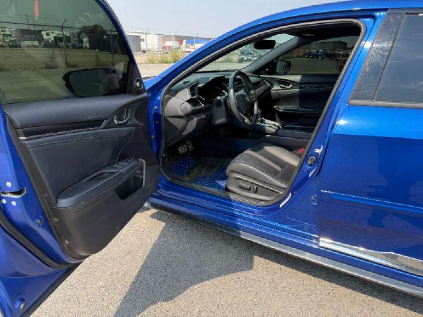 2020 BLUE /SPORT Honda Civic Hatchback (SHHFK7H90LU) with an 15 I4 TURBO engine, Automatic transmission, located at 1175 N Woodruff Ave, Idaho Falls, ID, 83401, 43.506901, -111.999657 - At Timberline Auto, finding a great deal on your next vehicle is always easy! Our experienced sales staff's goal is to help find you the right vehicle at the right price! Our knowledgeable finance department has options for almost any credit score. We offer extended service contract options to prote - Photo#35