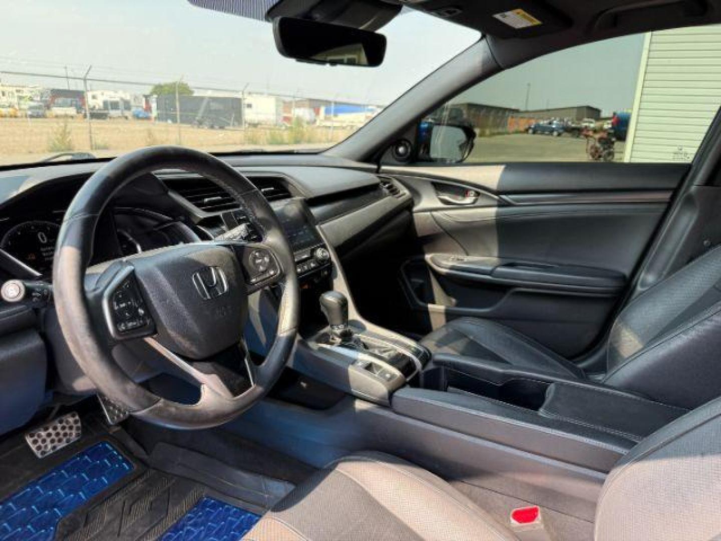 2020 BLUE /SPORT Honda Civic Hatchback (SHHFK7H90LU) with an 15 I4 TURBO engine, Automatic transmission, located at 1175 N Woodruff Ave, Idaho Falls, ID, 83401, 43.506901, -111.999657 - At Timberline Auto, finding a great deal on your next vehicle is always easy! Our experienced sales staff's goal is to help find you the right vehicle at the right price! Our knowledgeable finance department has options for almost any credit score. We offer extended service contract options to prote - Photo#37