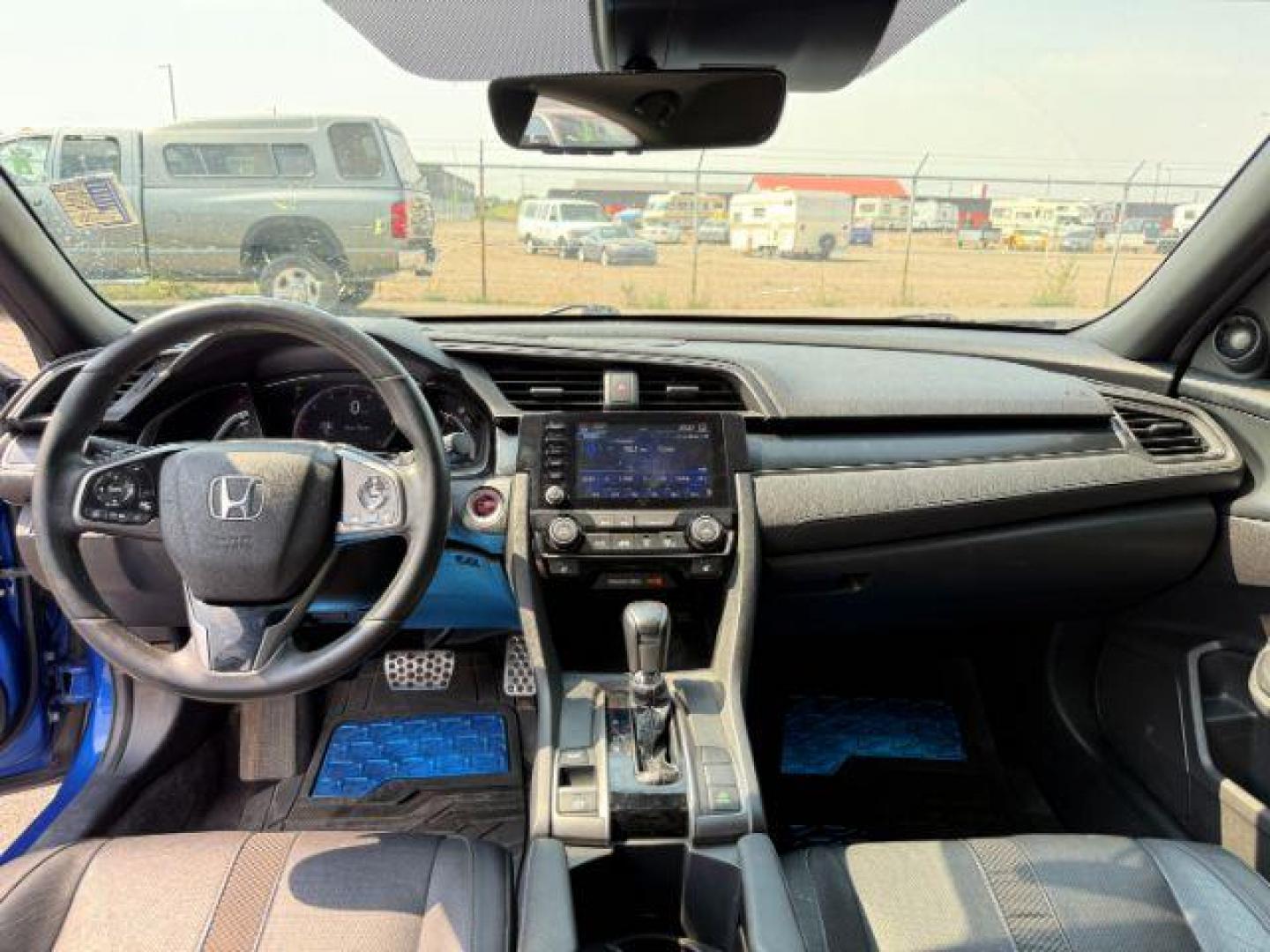 2020 BLUE /SPORT Honda Civic Hatchback (SHHFK7H90LU) with an 15 I4 TURBO engine, Automatic transmission, located at 1175 N Woodruff Ave, Idaho Falls, ID, 83401, 43.506901, -111.999657 - At Timberline Auto, finding a great deal on your next vehicle is always easy! Our experienced sales staff's goal is to help find you the right vehicle at the right price! Our knowledgeable finance department has options for almost any credit score. We offer extended service contract options to prote - Photo#45