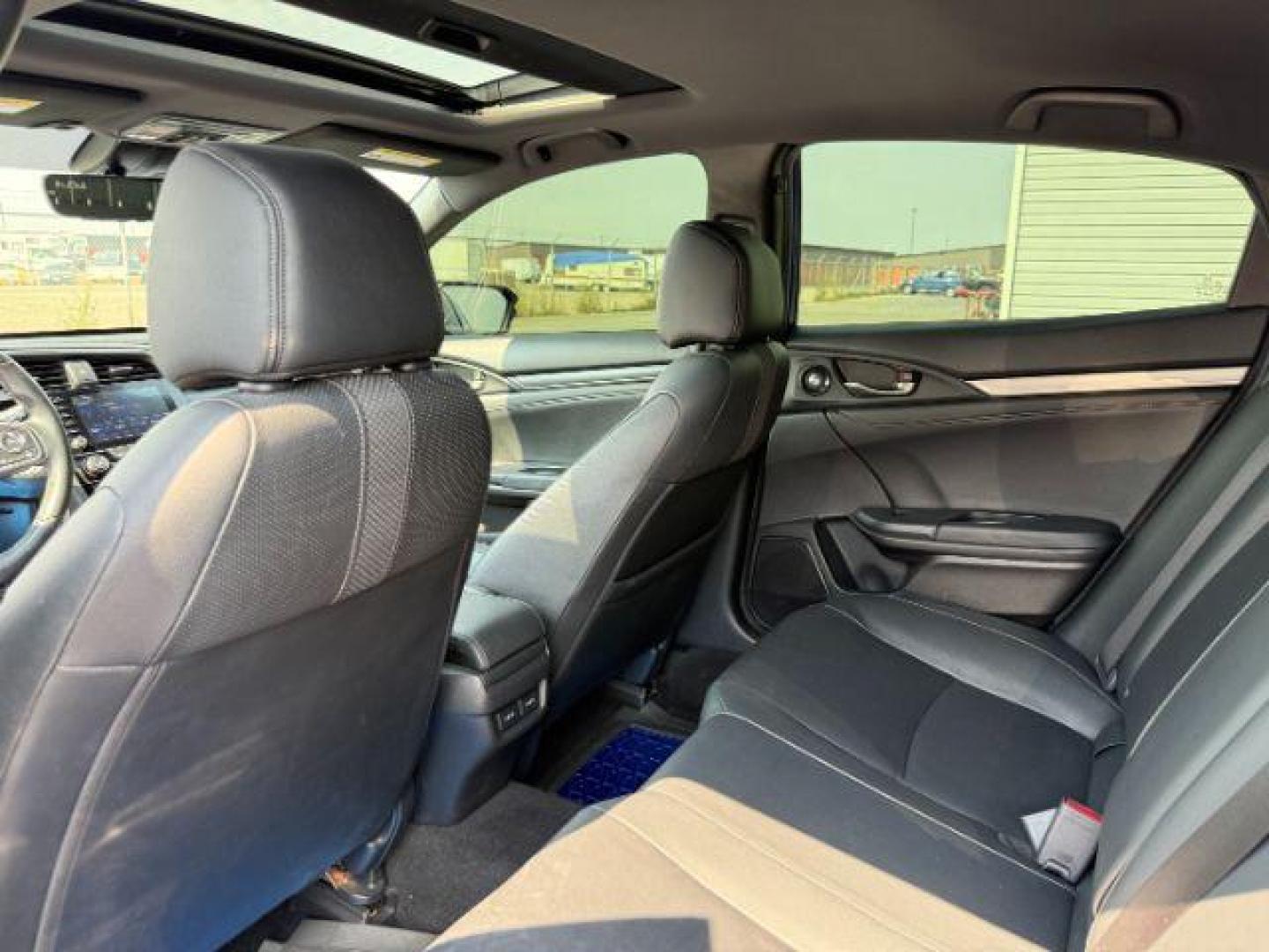 2020 BLUE /SPORT Honda Civic Hatchback (SHHFK7H90LU) with an 15 I4 TURBO engine, Automatic transmission, located at 1175 N Woodruff Ave, Idaho Falls, ID, 83401, 43.506901, -111.999657 - At Timberline Auto, finding a great deal on your next vehicle is always easy! Our experienced sales staff's goal is to help find you the right vehicle at the right price! Our knowledgeable finance department has options for almost any credit score. We offer extended service contract options to prote - Photo#47