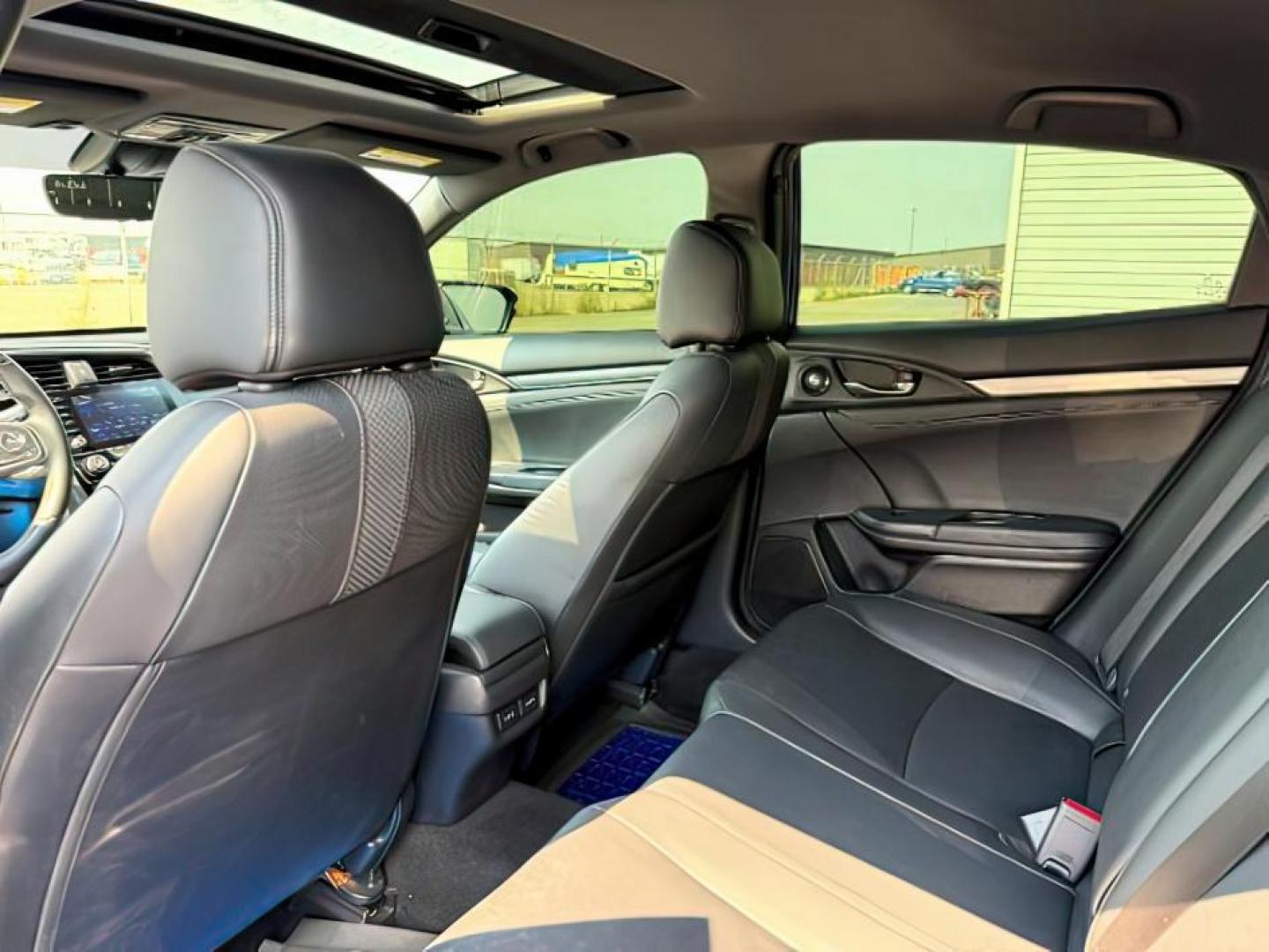 2020 BLUE /SPORT Honda Civic Hatchback (SHHFK7H90LU) with an 15 I4 TURBO engine, Automatic transmission, located at 1175 N Woodruff Ave, Idaho Falls, ID, 83401, 43.506901, -111.999657 - At Timberline Auto, finding a great deal on your next vehicle is always easy! Our experienced sales staff's goal is to help find you the right vehicle at the right price! Our knowledgeable finance department has options for almost any credit score. We offer extended service contract options to prote - Photo#23