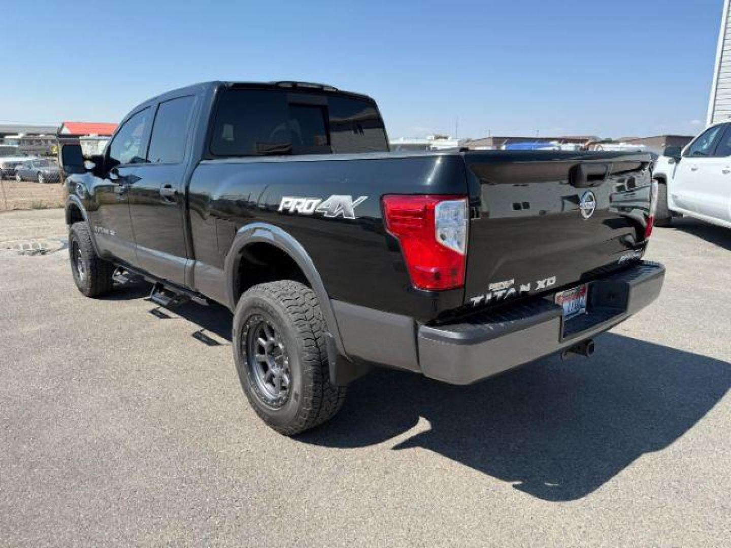 2017 BLACK /Black Nissan TITAN XD (1N6BA1F42HN) with an 5L V-8 diesel direct injection engine, Automatic transmission, located at 1175 N Woodruff Ave, Idaho Falls, ID, 83401, 43.506901, -111.999657 - At Timberline Auto, finding a great deal on your next vehicle is always easy! Our experienced sales staff's goal is to help find you the right vehicle at the right price! Our knowledgeable finance department has options for almost any credit score. We offer extended service contract options to prote - Photo#24