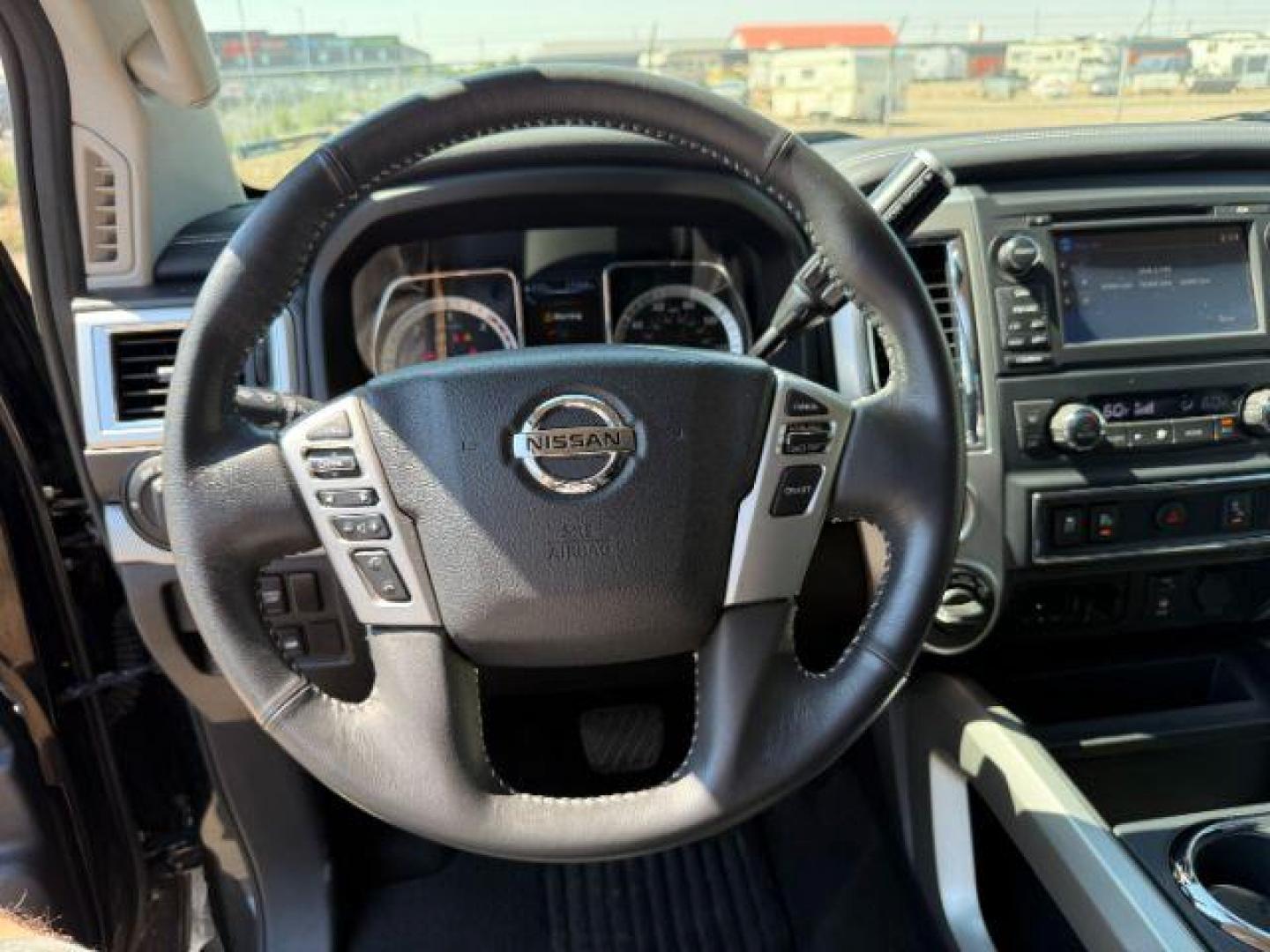 2017 BLACK /Black Nissan TITAN XD (1N6BA1F42HN) with an 5L V-8 diesel direct injection engine, Automatic transmission, located at 1175 N Woodruff Ave, Idaho Falls, ID, 83401, 43.506901, -111.999657 - At Timberline Auto, finding a great deal on your next vehicle is always easy! Our experienced sales staff's goal is to help find you the right vehicle at the right price! Our knowledgeable finance department has options for almost any credit score. We offer extended service contract options to prote - Photo#34