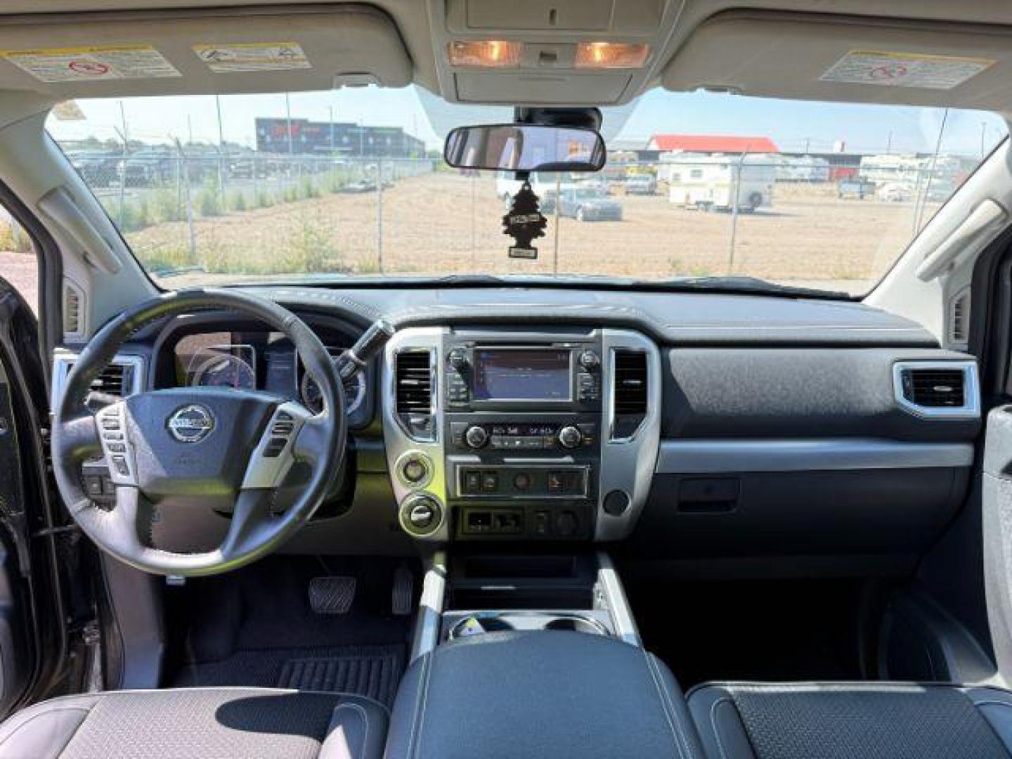 2017 BLACK /Black Nissan TITAN XD (1N6BA1F42HN) with an 5L V-8 diesel direct injection engine, Automatic transmission, located at 1175 N Woodruff Ave, Idaho Falls, ID, 83401, 43.506901, -111.999657 - At Timberline Auto, finding a great deal on your next vehicle is always easy! Our experienced sales staff's goal is to help find you the right vehicle at the right price! Our knowledgeable finance department has options for almost any credit score. We offer extended service contract options to prote - Photo#41