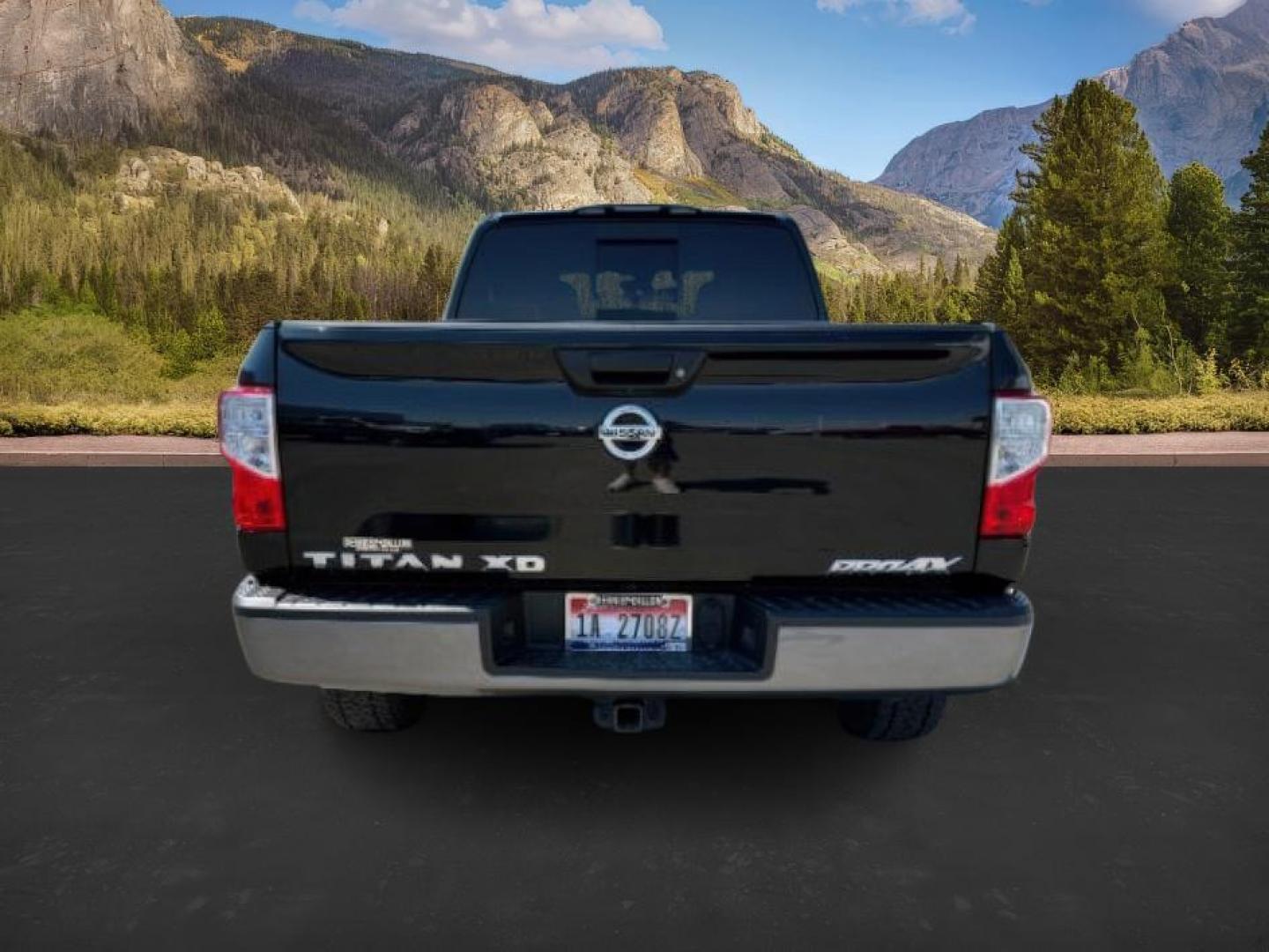 2017 BLACK /Black Nissan TITAN XD (1N6BA1F42HN) with an 5L V-8 diesel direct injection engine, Automatic transmission, located at 1175 N Woodruff Ave, Idaho Falls, ID, 83401, 43.506901, -111.999657 - At Timberline Auto, finding a great deal on your next vehicle is always easy! Our experienced sales staff's goal is to help find you the right vehicle at the right price! Our knowledgeable finance department has options for almost any credit score. We offer extended service contract options to prote - Photo#3