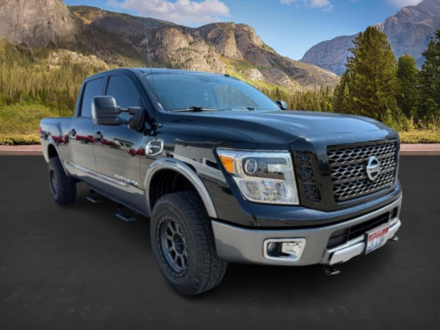 2017 BLACK /Black Nissan TITAN XD (1N6BA1F42HN) with an 5L V-8 diesel direct injection engine, Automatic transmission, located at 1175 N Woodruff Ave, Idaho Falls, ID, 83401, 43.506901, -111.999657 - At Timberline Auto, finding a great deal on your next vehicle is always easy! Our experienced sales staff's goal is to help find you the right vehicle at the right price! Our knowledgeable finance department has options for almost any credit score. We offer extended service contract options to prote - Photo#6