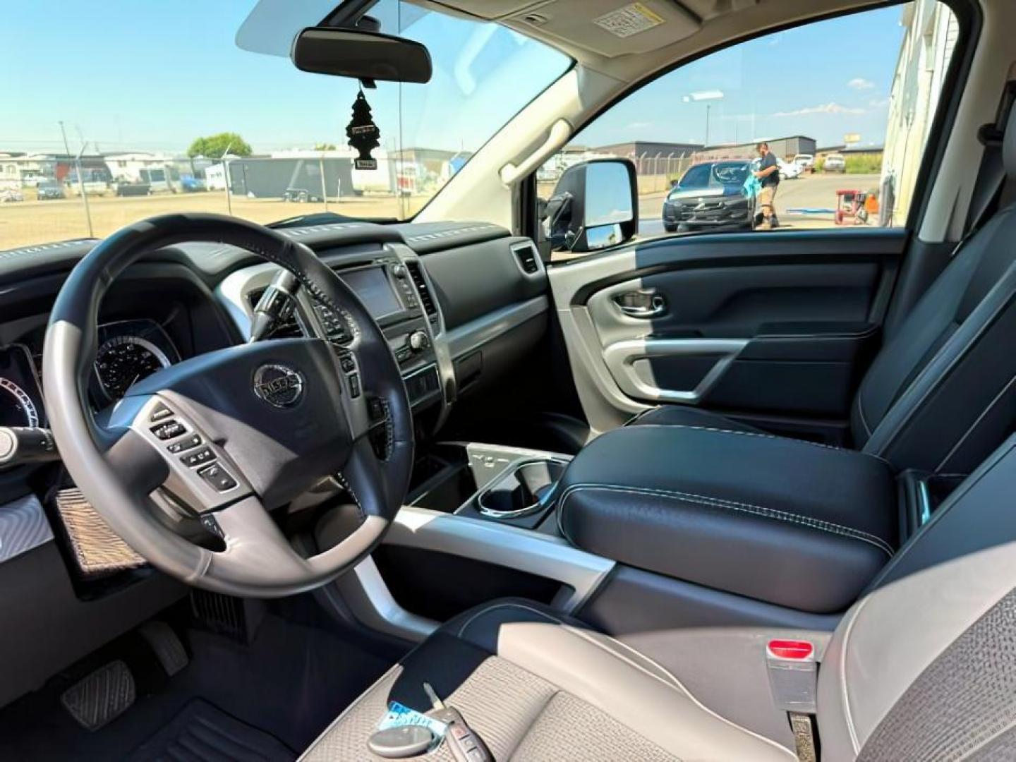2017 BLACK /Black Nissan TITAN XD (1N6BA1F42HN) with an 5L V-8 diesel direct injection engine, Automatic transmission, located at 1175 N Woodruff Ave, Idaho Falls, ID, 83401, 43.506901, -111.999657 - At Timberline Auto, finding a great deal on your next vehicle is always easy! Our experienced sales staff's goal is to help find you the right vehicle at the right price! Our knowledgeable finance department has options for almost any credit score. We offer extended service contract options to prote - Photo#11