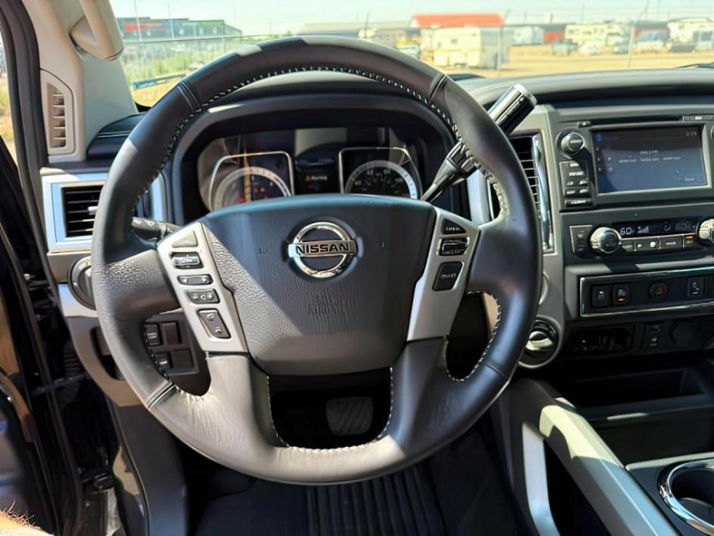2017 BLACK /Black Nissan TITAN XD (1N6BA1F42HN) with an 5L V-8 diesel direct injection engine, Automatic transmission, located at 1175 N Woodruff Ave, Idaho Falls, ID, 83401, 43.506901, -111.999657 - At Timberline Auto, finding a great deal on your next vehicle is always easy! Our experienced sales staff's goal is to help find you the right vehicle at the right price! Our knowledgeable finance department has options for almost any credit score. We offer extended service contract options to prote - Photo#12