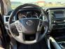 2017 BLACK /Black Nissan TITAN XD (1N6BA1F42HN) with an 5L V-8 diesel direct injection engine, Automatic transmission, located at 1175 N Woodruff Ave, Idaho Falls, ID, 83401, 43.506901, -111.999657 - At Timberline Auto, finding a great deal on your next vehicle is always easy! Our experienced sales staff's goal is to help find you the right vehicle at the right price! Our knowledgeable finance department has options for almost any credit score. We offer extended service contract options to prote - Photo#12