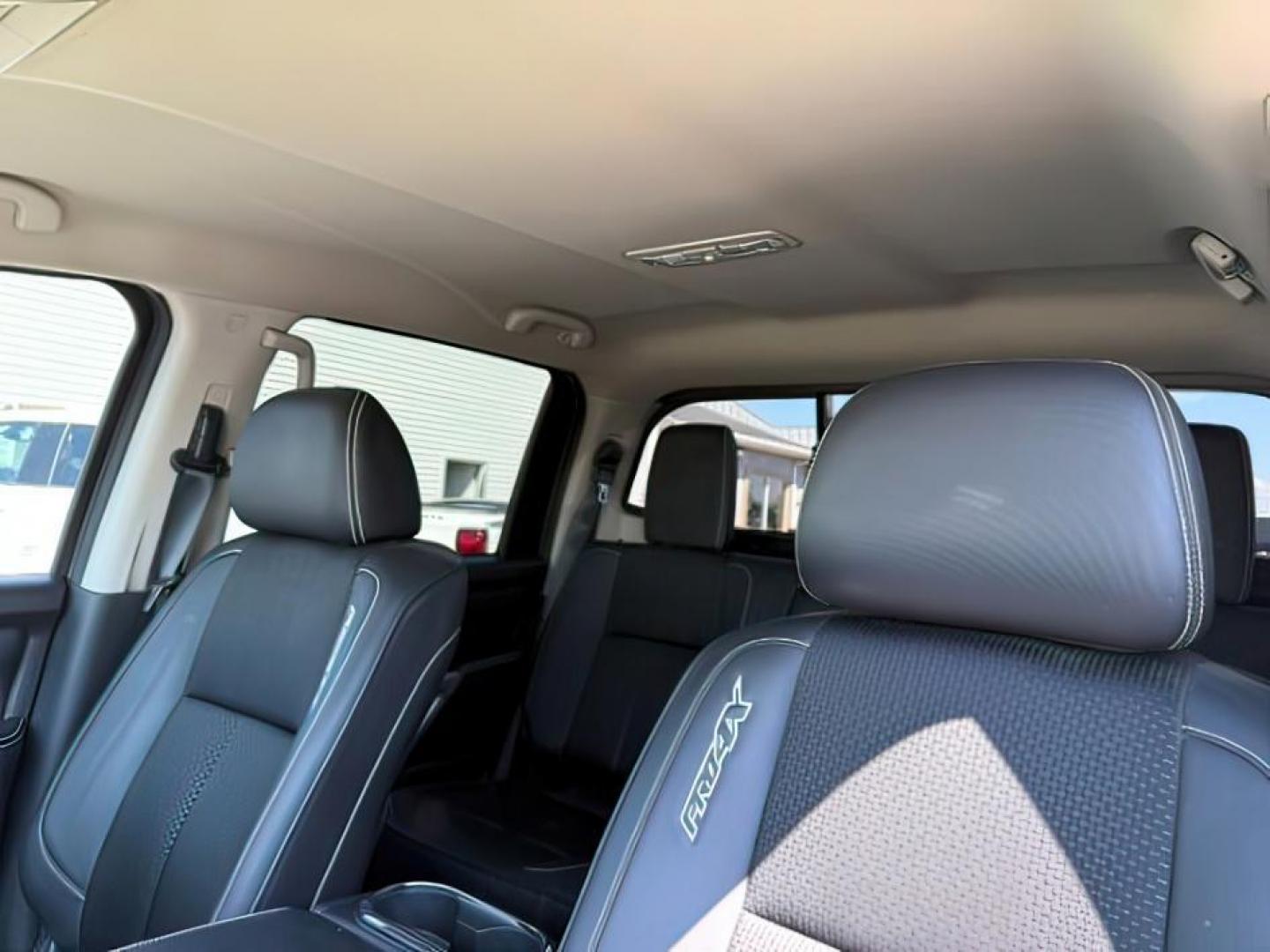 2017 BLACK /Black Nissan TITAN XD (1N6BA1F42HN) with an 5L V-8 diesel direct injection engine, Automatic transmission, located at 1175 N Woodruff Ave, Idaho Falls, ID, 83401, 43.506901, -111.999657 - At Timberline Auto, finding a great deal on your next vehicle is always easy! Our experienced sales staff's goal is to help find you the right vehicle at the right price! Our knowledgeable finance department has options for almost any credit score. We offer extended service contract options to prote - Photo#17