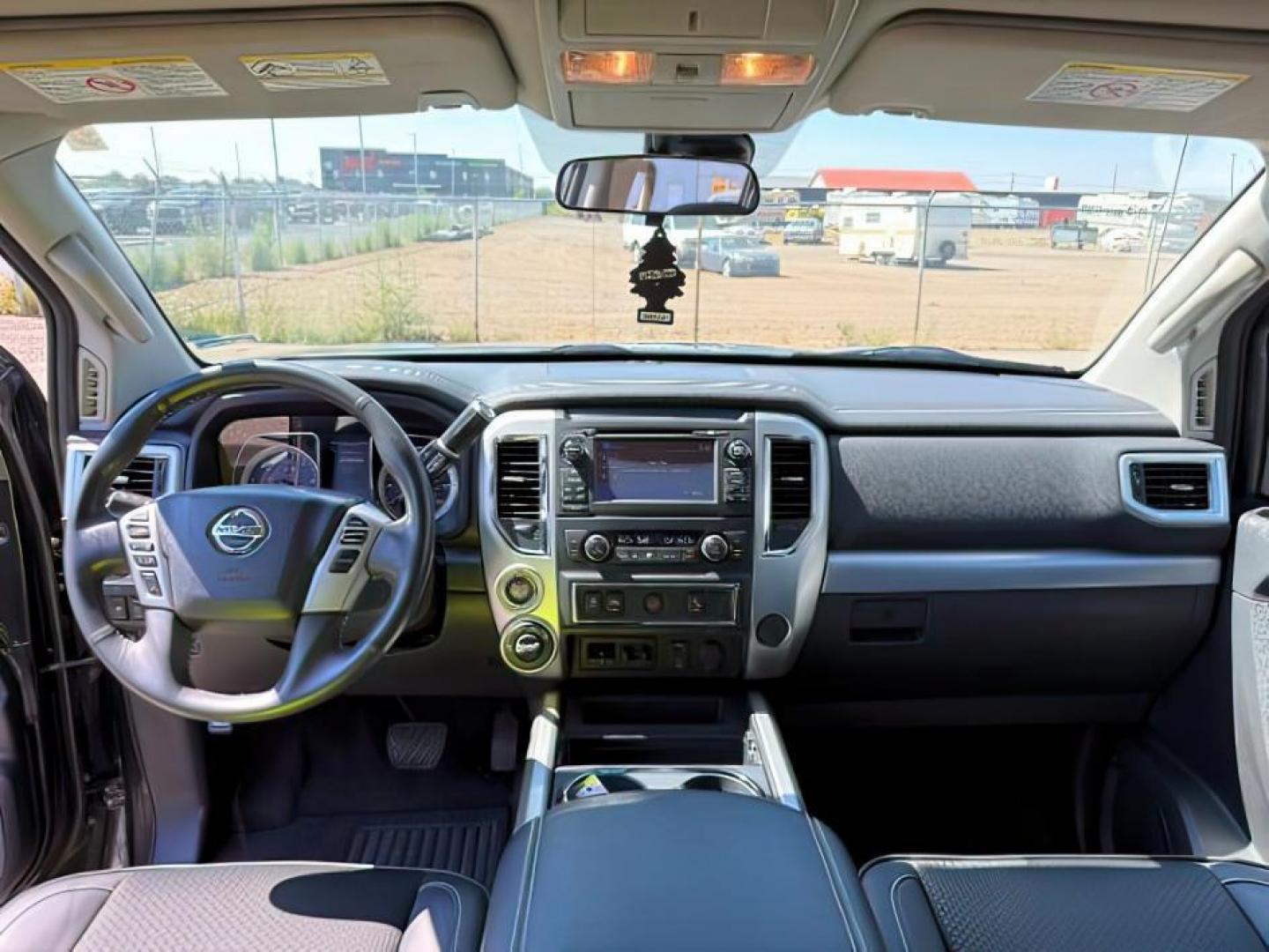 2017 BLACK /Black Nissan TITAN XD (1N6BA1F42HN) with an 5L V-8 diesel direct injection engine, Automatic transmission, located at 1175 N Woodruff Ave, Idaho Falls, ID, 83401, 43.506901, -111.999657 - At Timberline Auto, finding a great deal on your next vehicle is always easy! Our experienced sales staff's goal is to help find you the right vehicle at the right price! Our knowledgeable finance department has options for almost any credit score. We offer extended service contract options to prote - Photo#19