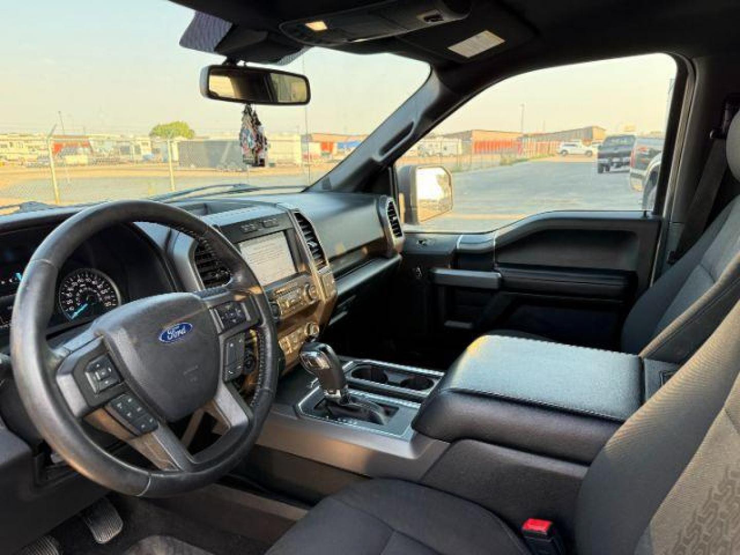 2019 Oxford White /Black Ford F-150 (1FTEW1EP7KF) with an EcoBoost 27L V-6 portdirect injection engine, Automatic transmission, located at 1175 N Woodruff Ave, Idaho Falls, ID, 83401, 43.506901, -111.999657 - At Timberline Auto, finding a great deal on your next vehicle is always easy! Our experienced sales staff's goal is to help find you the right vehicle at the right price! Our knowledgeable finance department has options for almost any credit score. We offer extended service contract options to prote - Photo#12