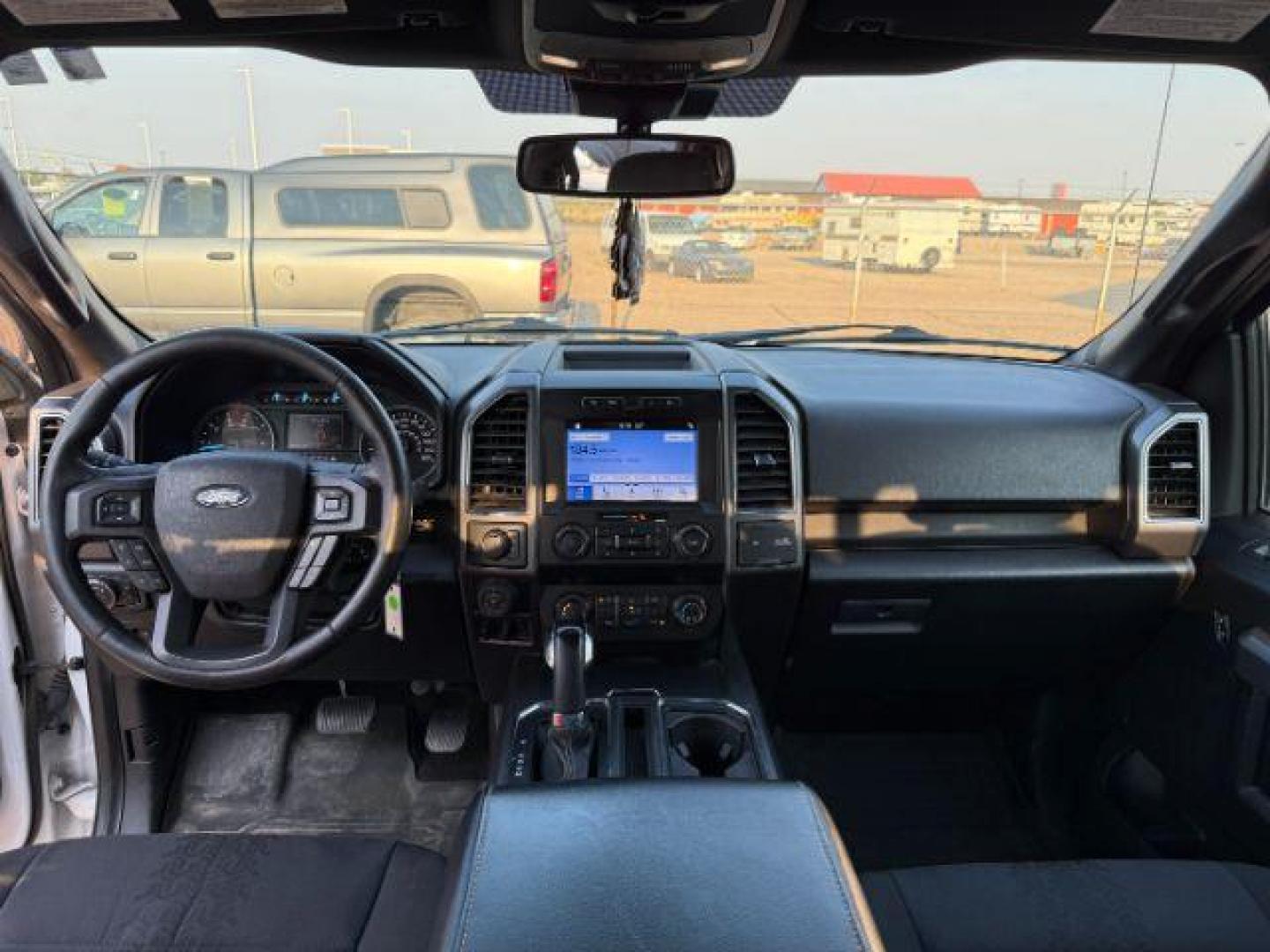 2019 Oxford White /Black Ford F-150 (1FTEW1EP7KF) with an EcoBoost 27L V-6 portdirect injection engine, Automatic transmission, located at 1175 N Woodruff Ave, Idaho Falls, ID, 83401, 43.506901, -111.999657 - At Timberline Auto, finding a great deal on your next vehicle is always easy! Our experienced sales staff's goal is to help find you the right vehicle at the right price! Our knowledgeable finance department has options for almost any credit score. We offer extended service contract options to prote - Photo#19