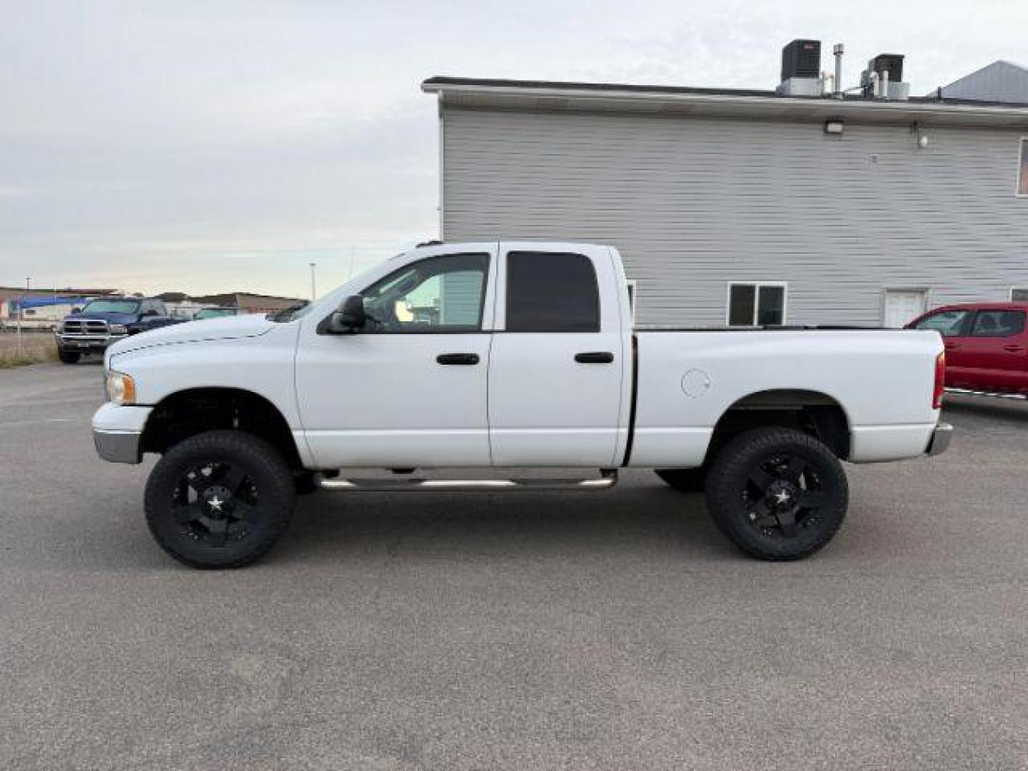 2003 WHITE /Dark Slate Gray Dodge Ram 3500 (3D7LU38653G) with an Cummins 59L I-6 diesel direct injection engine, Automatic transmission, located at 1175 N Woodruff Ave, Idaho Falls, ID, 83401, 43.506901, -111.999657 - At Timberline Auto, finding a great deal on your next vehicle is always easy! Our experienced sales staff's goal is to help find you the right vehicle at the right price! Our knowledgeable finance department has options for almost any credit score. We offer extended service contract options to prote - Photo#1