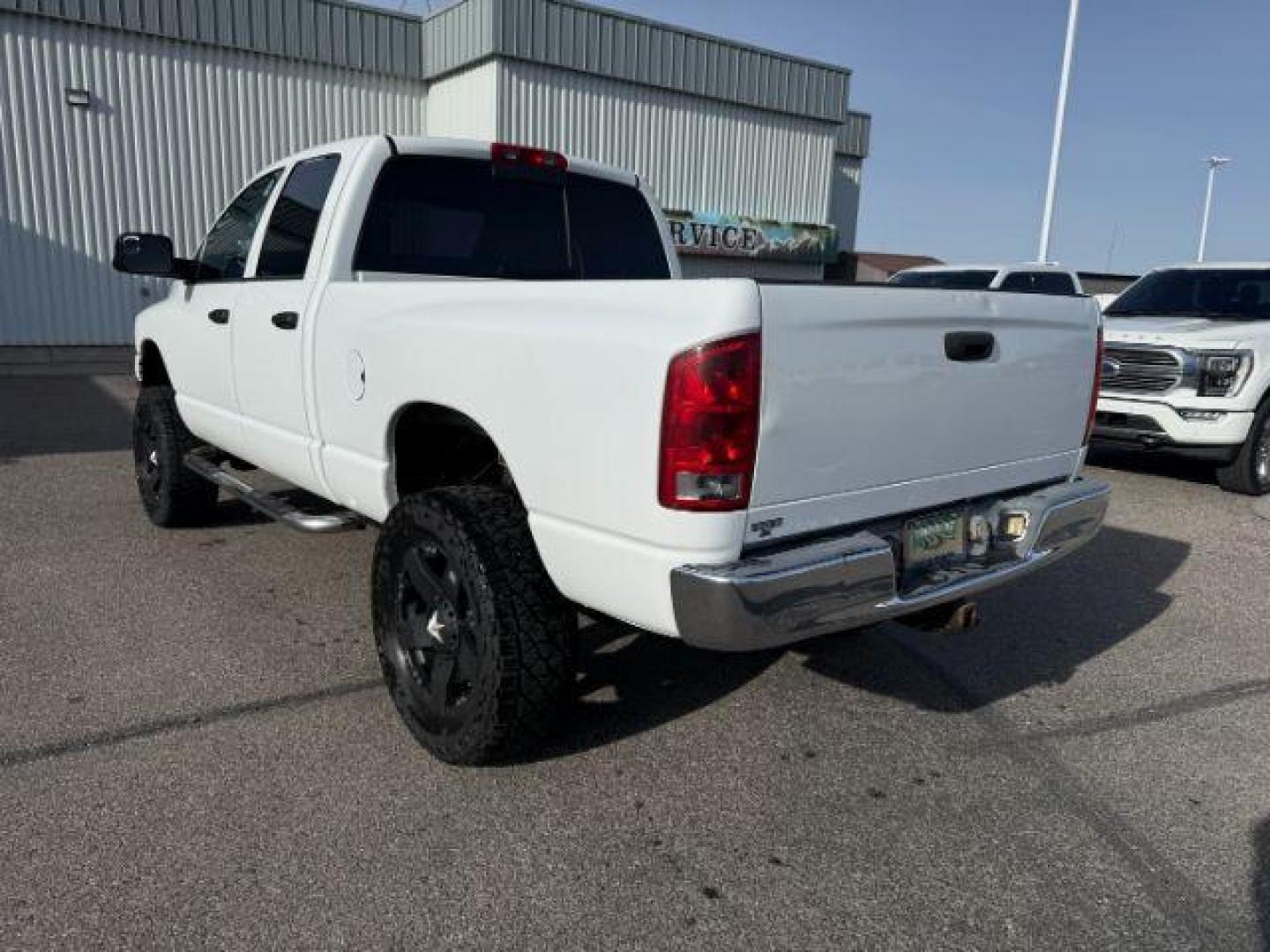 2003 WHITE /Dark Slate Gray Dodge Ram 3500 (3D7LU38653G) with an Cummins 59L I-6 diesel direct injection engine, Automatic transmission, located at 1175 N Woodruff Ave, Idaho Falls, ID, 83401, 43.506901, -111.999657 - At Timberline Auto, finding a great deal on your next vehicle is always easy! Our experienced sales staff's goal is to help find you the right vehicle at the right price! Our knowledgeable finance department has options for almost any credit score. We offer extended service contract options to prote - Photo#23