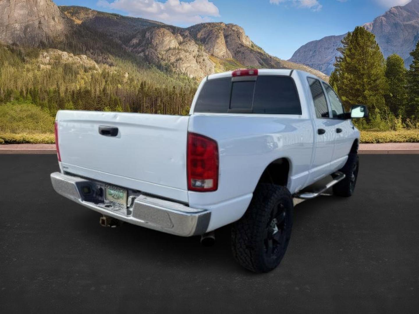 2003 WHITE /Dark Slate Gray Dodge Ram 3500 (3D7LU38653G) with an Cummins 59L I-6 diesel direct injection engine, Automatic transmission, located at 1175 N Woodruff Ave, Idaho Falls, ID, 83401, 43.506901, -111.999657 - At Timberline Auto, finding a great deal on your next vehicle is always easy! Our experienced sales staff's goal is to help find you the right vehicle at the right price! Our knowledgeable finance department has options for almost any credit score. We offer extended service contract options to prote - Photo#5