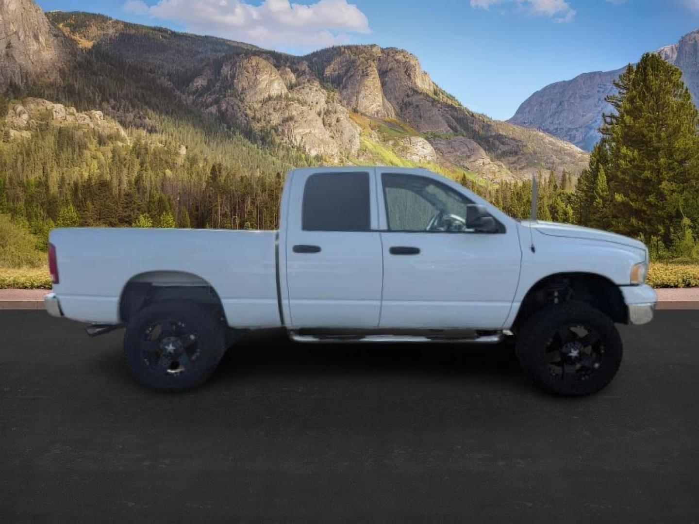 2003 WHITE /Dark Slate Gray Dodge Ram 3500 (3D7LU38653G) with an Cummins 59L I-6 diesel direct injection engine, Automatic transmission, located at 1175 N Woodruff Ave, Idaho Falls, ID, 83401, 43.506901, -111.999657 - At Timberline Auto, finding a great deal on your next vehicle is always easy! Our experienced sales staff's goal is to help find you the right vehicle at the right price! Our knowledgeable finance department has options for almost any credit score. We offer extended service contract options to prote - Photo#6